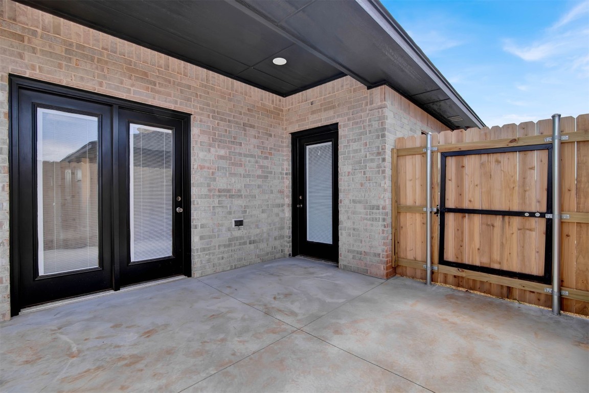 2105 Valley View, Weatherford, OK 73096 view of patio with french doors