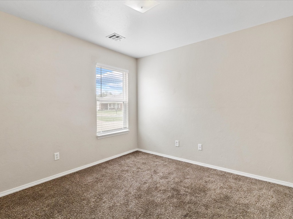 9708 SW 24th Terrace, Oklahoma City, OK 73128 empty room featuring carpet
