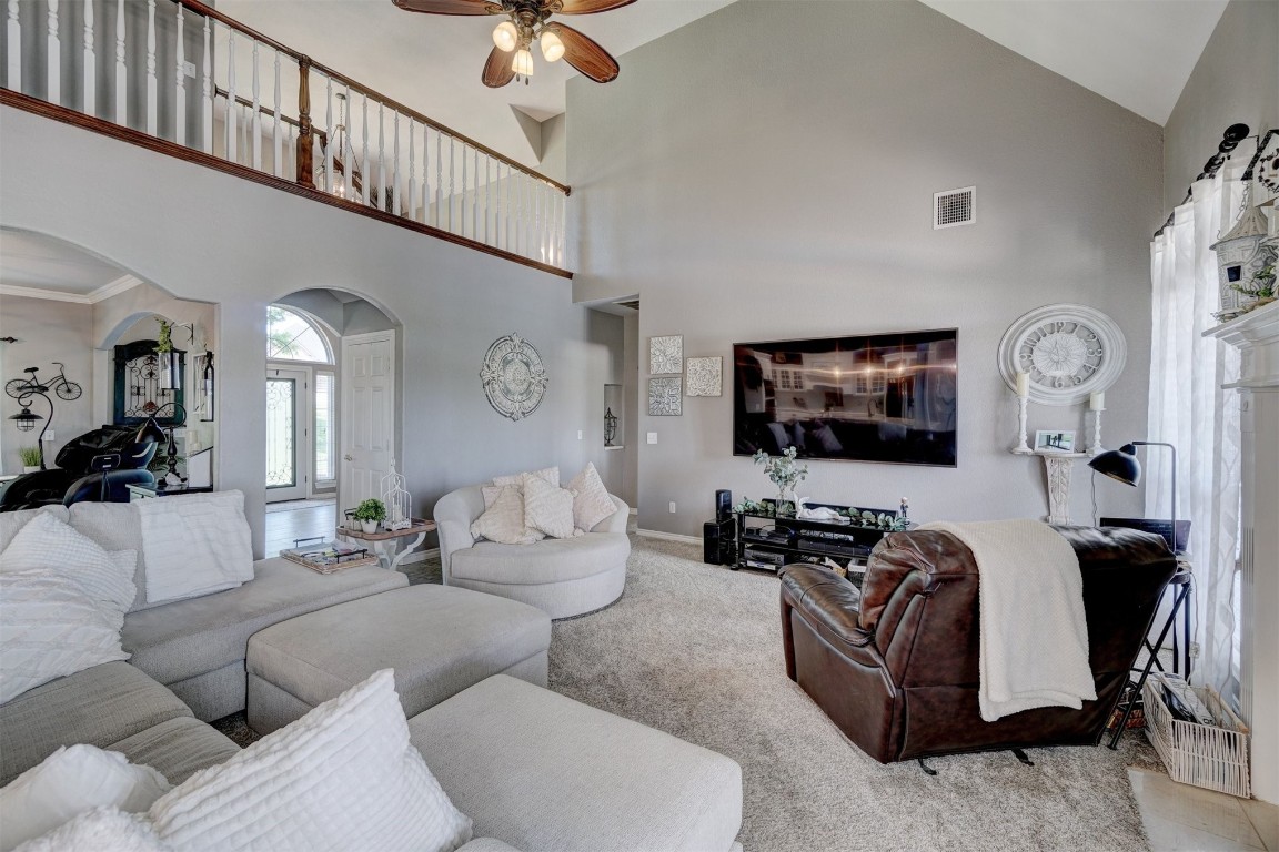 1918 Tyler Terrace, Prague, OK 74864 living room featuring high vaulted ceiling and ceiling fan