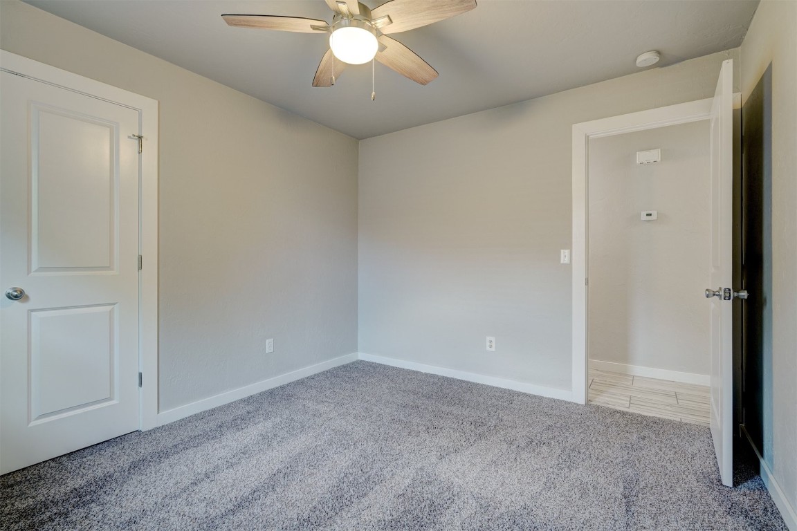 10112 Midfield Cross Street, Oklahoma City, OK 73159 carpeted empty room featuring ceiling fan