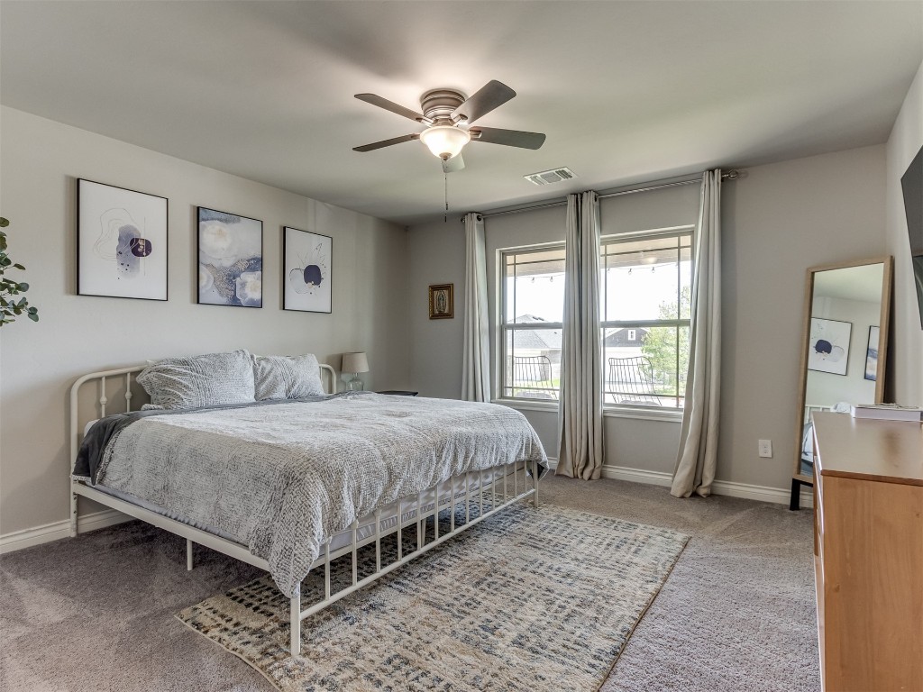 13313 Watson Drive, Piedmont, OK 73078 carpeted bedroom featuring ceiling fan