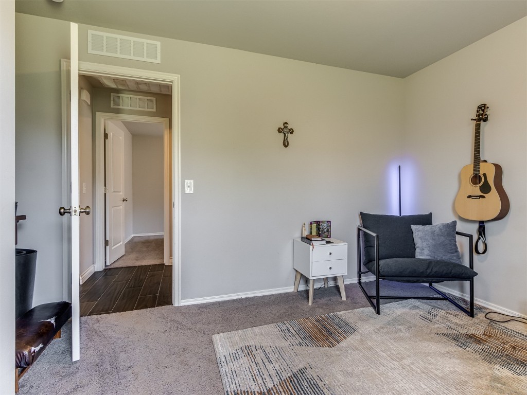13313 Watson Drive, Piedmont, OK 73078 sitting room featuring dark hardwood / wood-style flooring