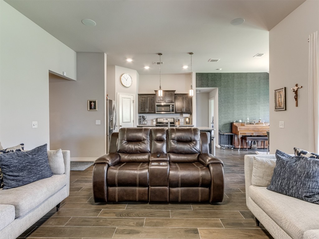 13313 Watson Drive, Piedmont, OK 73078 living room featuring hardwood / wood-style floors