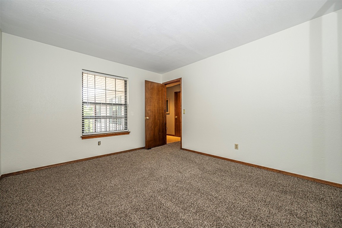 4400 Hemingway Drive, #242, Oklahoma City, OK 73118 view of carpeted spare room