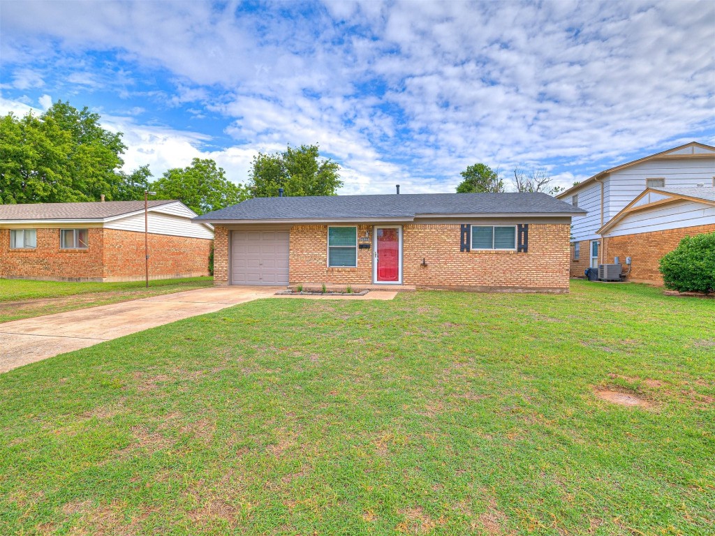 7125 NW 17th Street, Bethany, OK 73008 spare room featuring hardwood / wood-style flooring and ceiling fan