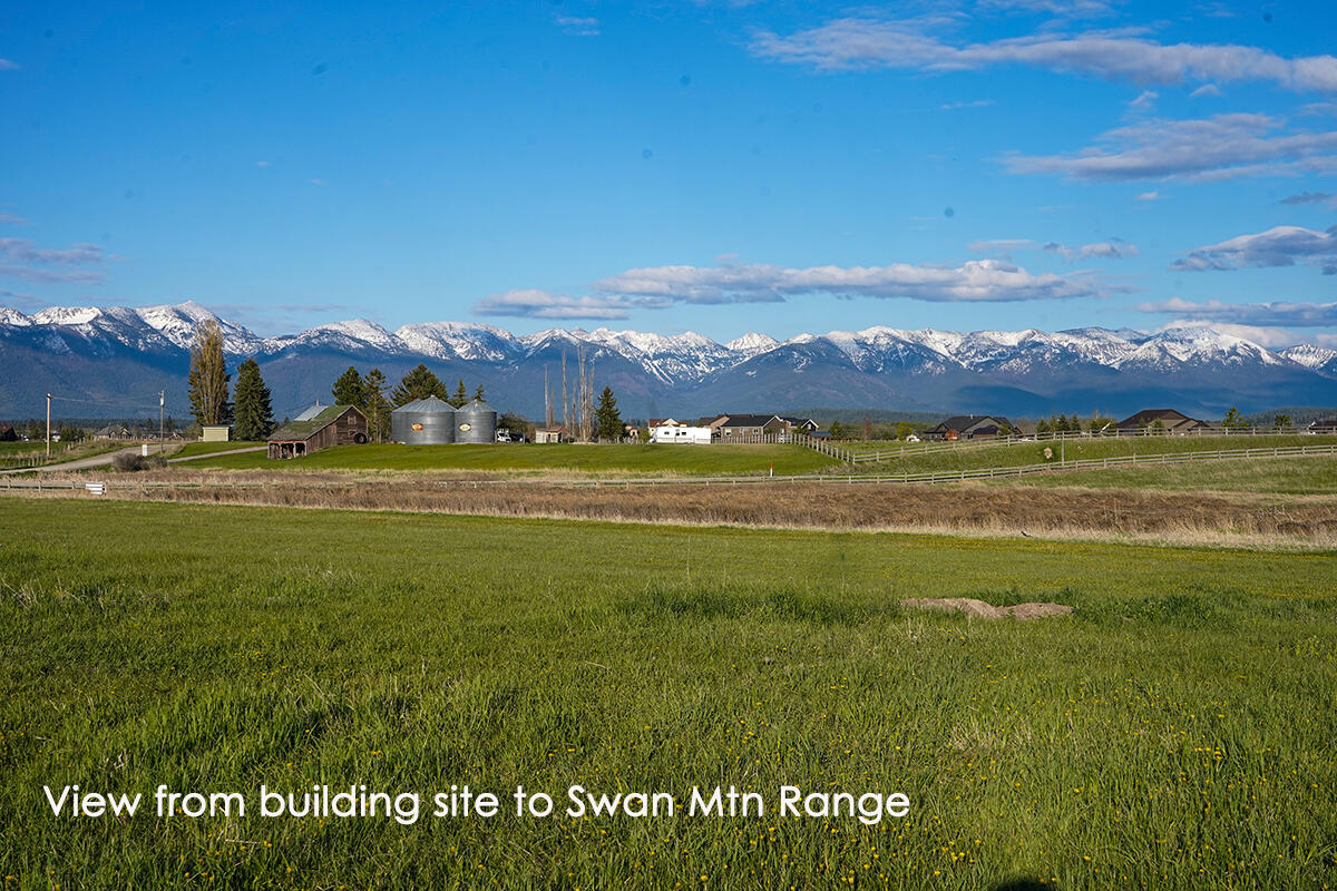 Seven acres of land in Lower Valley at corner of Farm & Manning Rds The NW portion is level and as you move east there is some lower elevation wetland. Swan Range views to enjoy along with stunning sunrises to the east and sunsets to west. Shared well system through Sky Ranch Addn water user agreement. If a new owner would like to have access to the Sky Ranch runway, a taxiway easement can be additionally purchased through the neighboring lot to the west. Call Scott Hollinger at 406-253-7268, or your real estate professional.