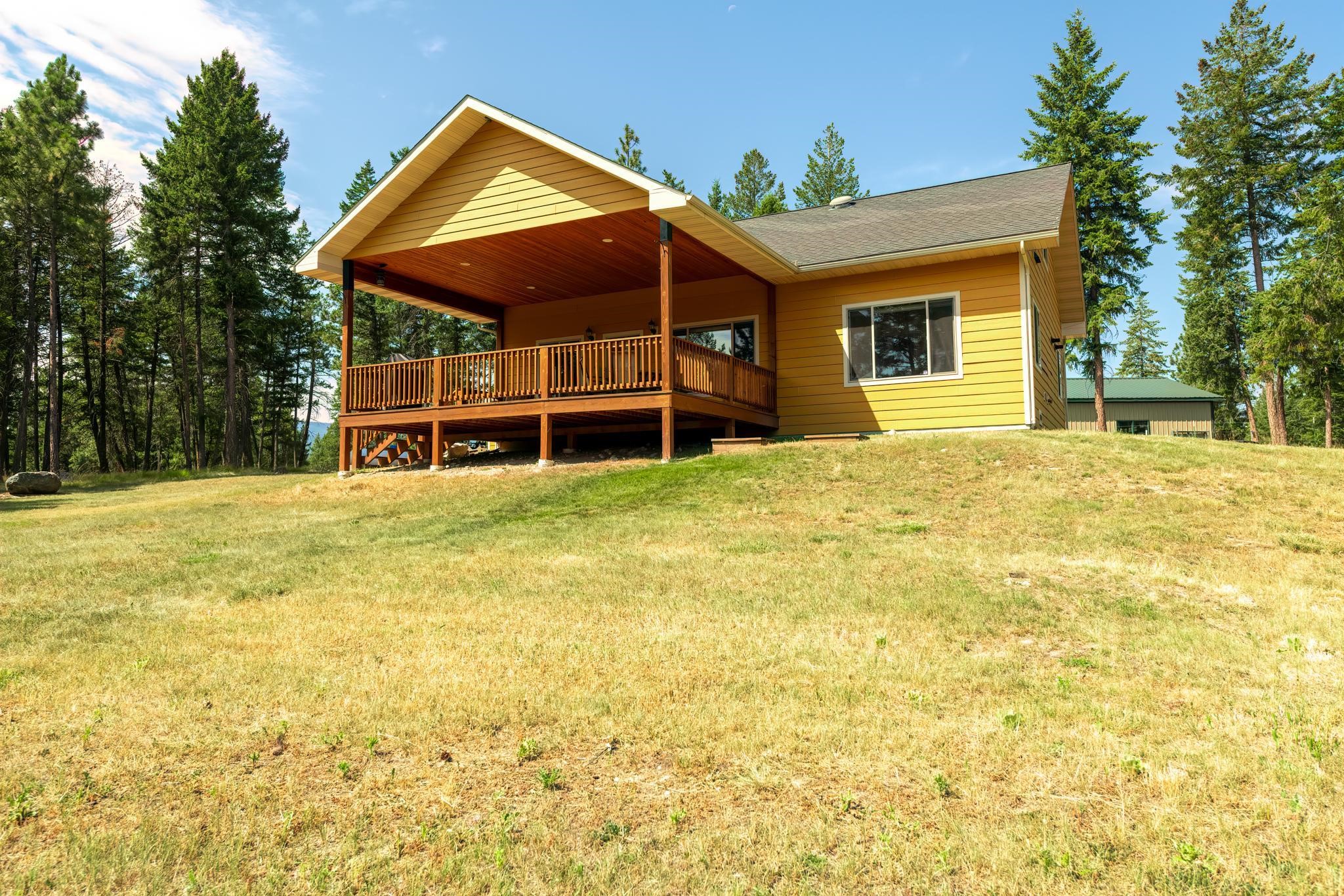 Check out the spectacular views from this exceptional, quality built home located in the charming community of the West Kootenai. The home has a great floorplan/design, utilizing every sq. ft. of space. There are 3 bedrooms on the main floor along with 2 full baths and a large bonus room upstairs. It has a cozy kitchen with a custom wood breakfast bar and a huge covered deck to take in the serene valley and lake views. The location is in the heart of Amish country and is just a short hike to the General Store, so as you're traveling down the road, keep your eyes open for horse & buggie's, bicycles and local baking stands. This property is less then 2 miles to the beautiful, sought after Lake Koocanusa which has an abundance of wildlife and National Forest land nearby that will provide endless outdoor recreation and activities to enjoy. The home's furnishings are negotiable. For more information contact Gary Mason (406) 261-6979 or your real estate professional.
