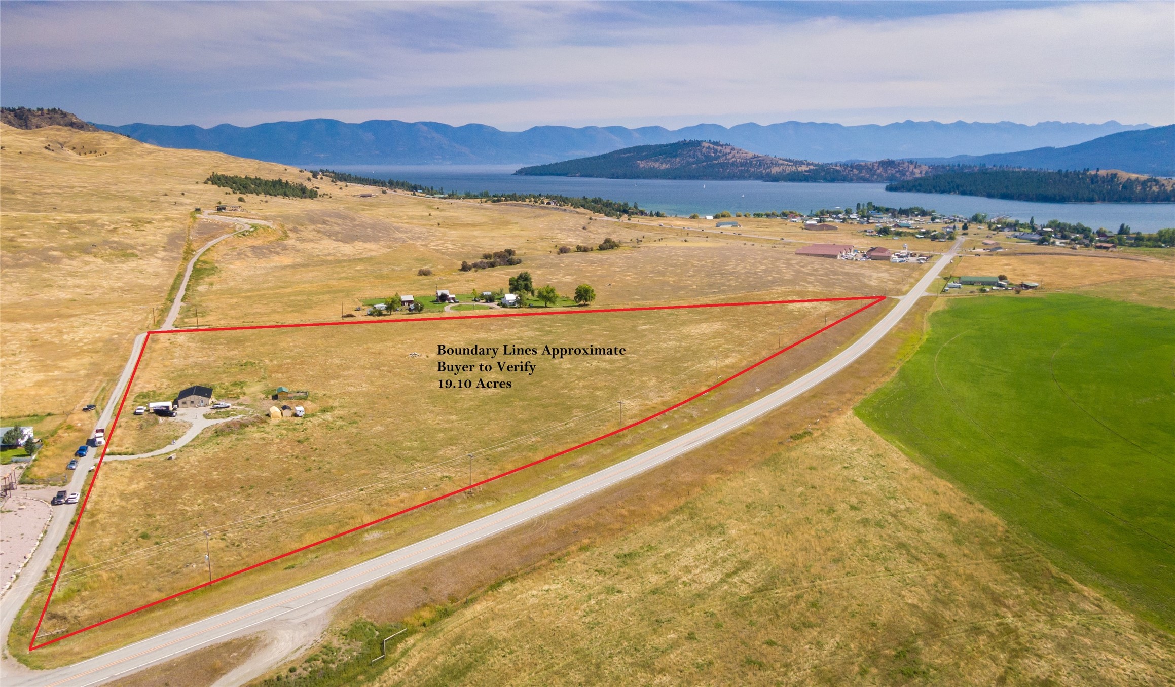 Come build your dream home from this private and gently rolling 19+ acre parcel with exceptional lake and mountain views!  Located at the doorstep to an unlimited supply of outdoor recreational opportunities in the coveted Northwestern region of MT- just minutes to Flathead Lake, Lake Mary Ronan and Blacktail Mountain Ski Area.  This property has undergone extensive infrastructure improvements since 2021, which will save the future owner substantial time and upfront costs.  Sale includes an existing well, 5-bedroom septic for plenty of sizing flexibility in the future residence, and a 1,200 sqft shop converted living quarters- allowing the future owner the convenience of living on site while building their primary dwelling!  The existing living quarters features two private rooms, full bathroom, open concept living area, full kitchen, efficient fireplace and in-floor heating system.  No covenants. Easy access to highway 93, only 30 minutes to Kalispell (one of Montana’s fastest growing cities, equipped with an international airport) for all your shopping, healthcare, and dining needs!  Don’t miss the opportunity to claim this desirable piece of property in the Treasure State!  Call Cole Wallace at 406-883-5387 or your real estate professional for additional information or to schedule a showing today.