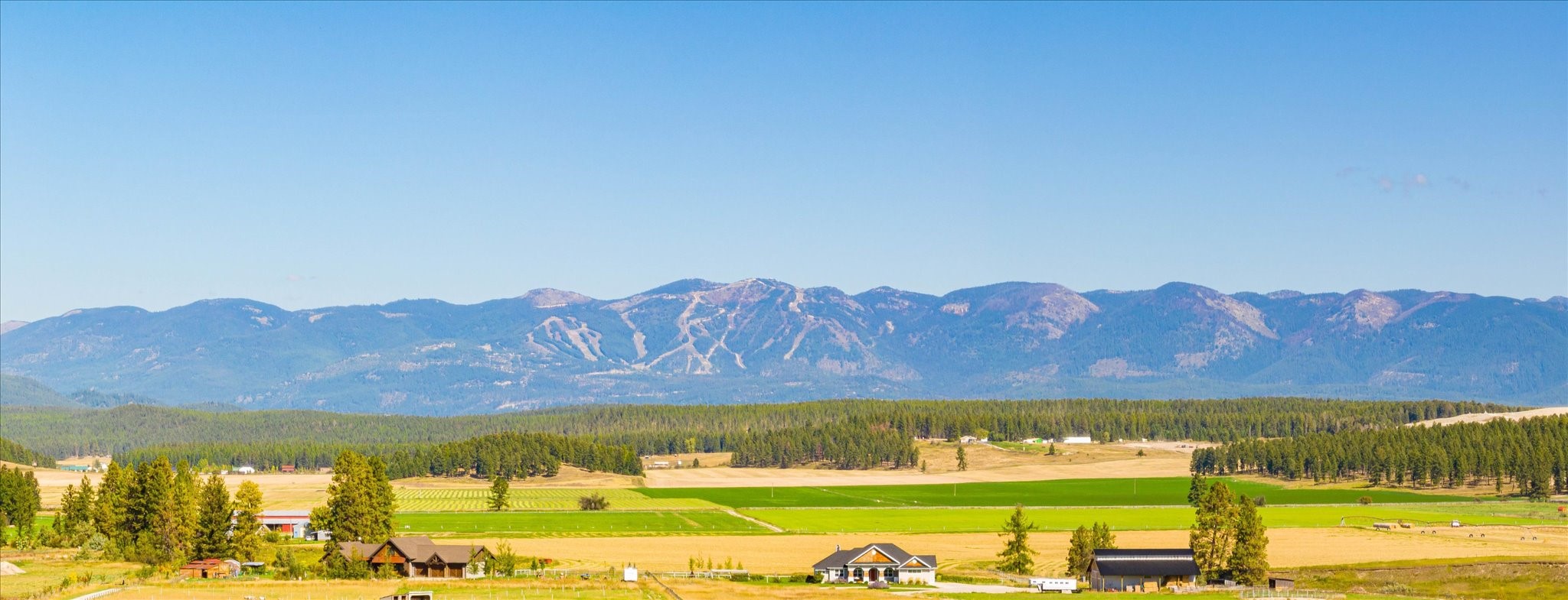 RARE FIND! NOW INCLUDES completed blue prints for 3500 sq. ft. home! Jewel, one-of-a-kind lot in peaceful, popular Harvest View Subdivision, midway between Kalispell & Whitefish in fantastic country setting with 360 degree mountain views to include straight on open view to Whitefish Ski Resort. Lot is in perfect location, not far from entry, adjacent to open lot for community water system & backs to large open space! Suburb .73 acre perfect rectangle slightly sloped lot makes it easy to build your dream home! Subdivision offers community water system, septic approval, road maintenance included in HOA & located in ever popular Whitefish School District. Location boasts sweet country setting with a short drive to Glacier International Airport, not far from Bypass offering access to all services, a short drive to Flathead Lake, many of our amazing rivers & less than an hour to Glacier National Park. It's a great location! Contact Renee' Howe @ 406-885-4693 or your real estate professional