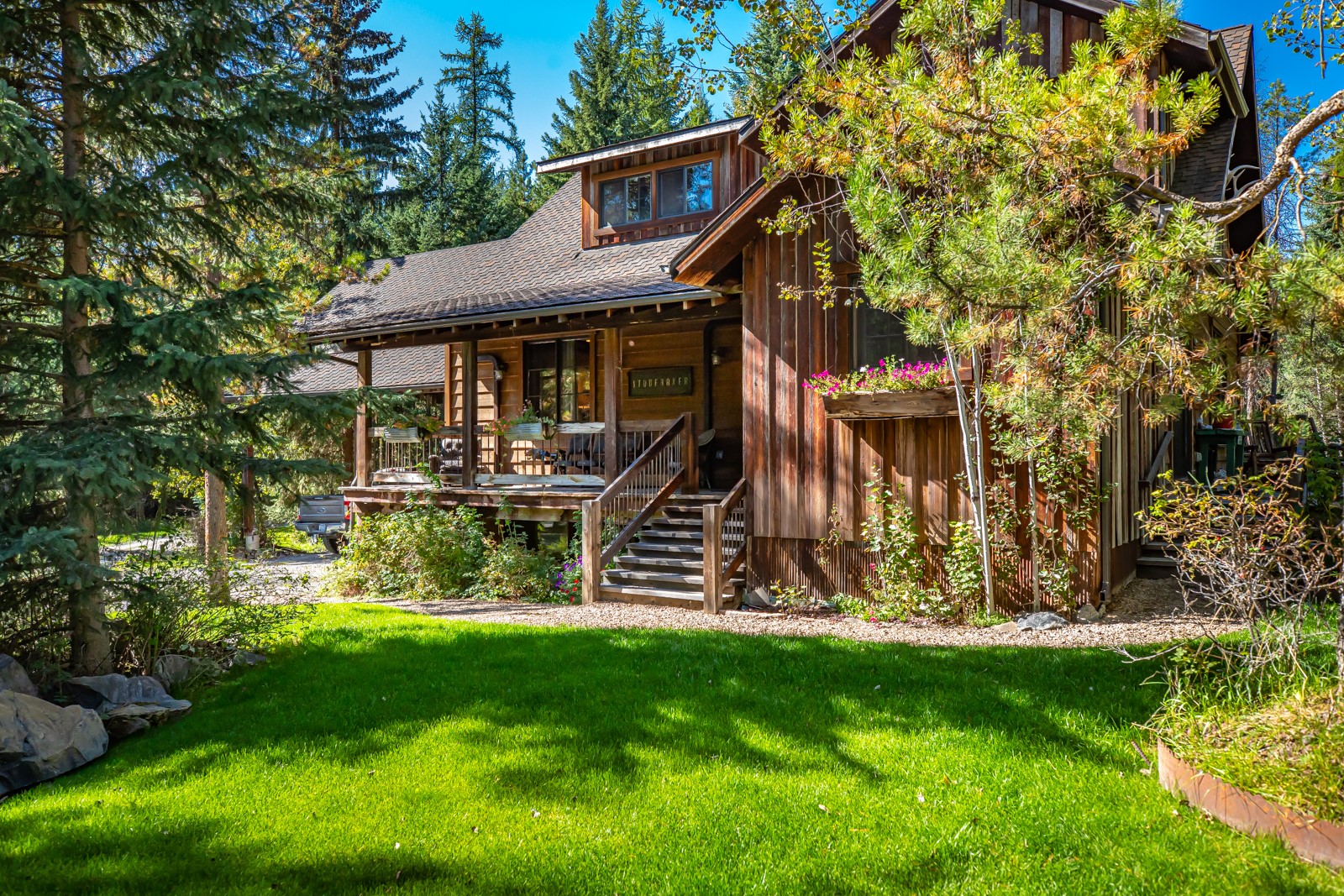 97 Aspen Bluff is the perfect blend of Montana rustic and down home comfort.  Offering a private wooded setting on just under 9 acres and only 10 minutes from downtown Whitefish, this home showcases custom handcrafted woodwork inside and out with all the Montana charm you can ask for.  Property has plenty of outbuildings including a barn, tack room/workshop, woodshed/play cabin, trapping shed and 2 guest apartments.  Home offers a main floor primary bedroom and living option, open living floor plan with vaulted ceilings and plenty of creative rustic touches with a total of 4 bedrooms, 4 bathrooms, 2 living rooms and a large loft area.  Each guest house has one bedroom, full kitchen, 3/4 bath and laundry.  Call Linda Chauner at 406-250-1192 or your real estate professional.
