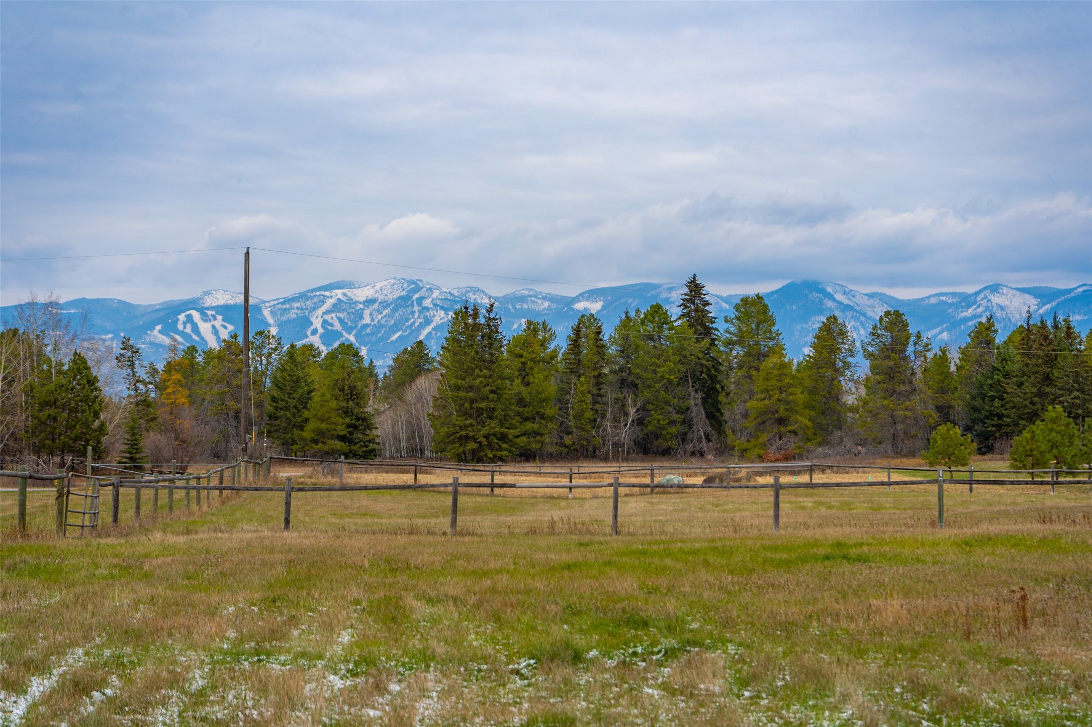 Wide Open Opportunity! This expansive mixed-use property, currently utilized as a residential haven w/ 3 distinct living units, spans 5+ flat & subdividable acres of prime real estate, boasting direct access to Highway US 93 S. Just Minutes from downtown Whitefish, this versatile property offers a wealth of possibilities. BS/HO zoning offers an array of potential uses, making it an ideal investment. Professional offices or creative workspaces, showrooms, farm/equipment sales, light assembly & manufacturing/fabrication to name a few. Additionally, the property offers various conditional uses, including a brewery/distillery, storage facilities, short-term rentals, & even multifamily dwellings. Main house: 2bed/1bath, Guest: 3/1, Apt: 1/1. 2 on-site septic systems to serve a total of 8 bedrooms. Don't miss out on the chance to own a piece of Whitefish offering such diverse potential. Please contact Aaron Noel/Brody Broker Team @ 406-407-4857 or your real estate professional.