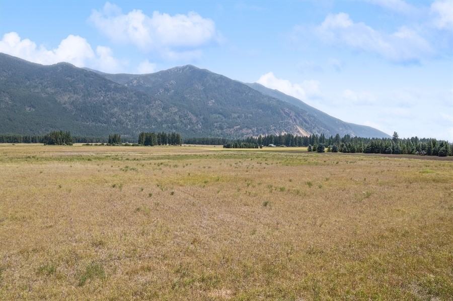 Don't miss this beautiful 8 acre parcel with spectacular mountain and valley views. No covenants, unzoned, and utilities nearby, and located at the end of a county road with a level usable terrain makes the opportunities endless. Easy access to Columbia Falls, Kalispell, Whitefish and Bigfork. Approximately 20 miles from Flathead Lake, Whitefish Mountain Ski Resort and the entrance of Glacier National Park. Seller will consider owner financing. !Additional acreage is available. Call Collette Bauer (406) 253-3176 or your real estate professional today!