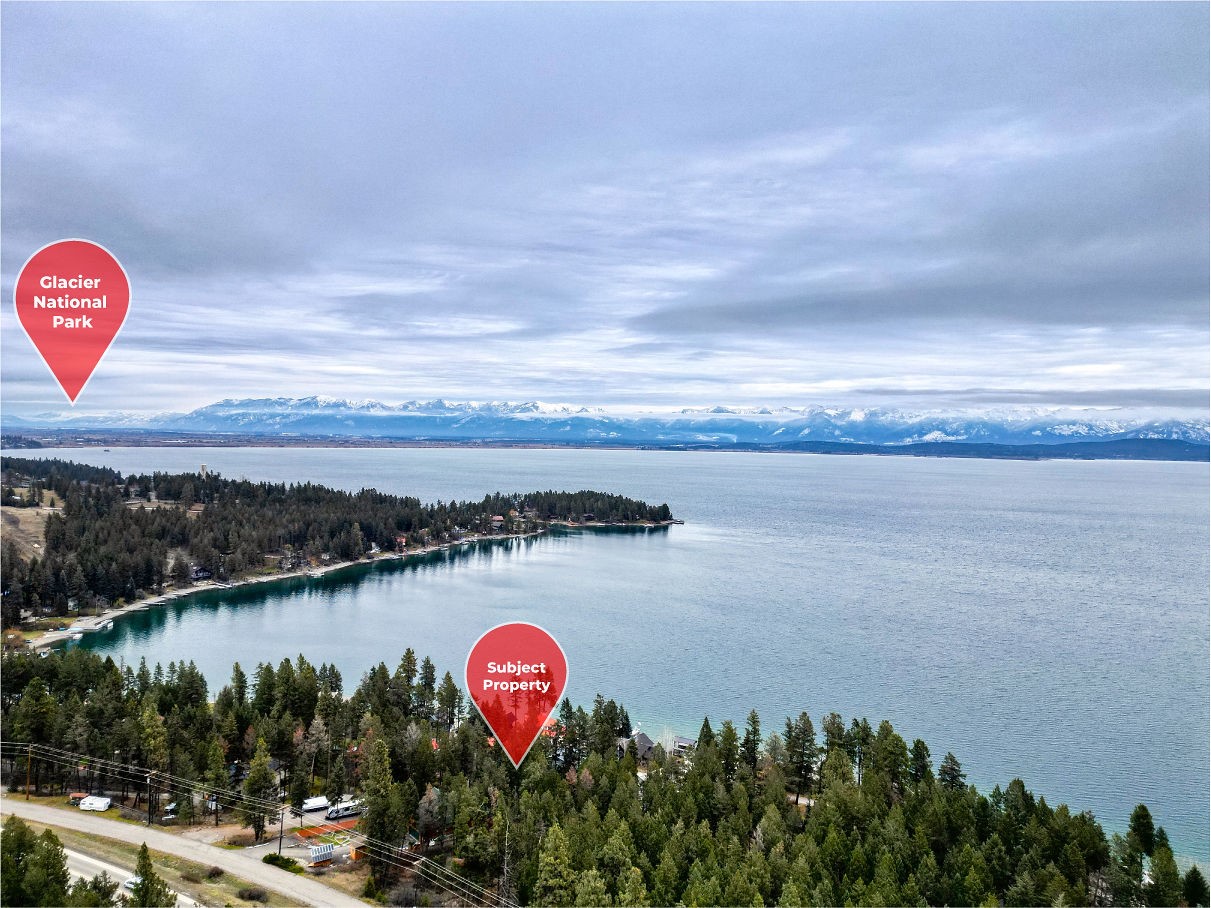 Very desirable lake view lot on prestigious Lakeside Blvd. This lot offers grand Flathead Lake views as well as a reasonably flat building pad ready to build your dream home.  No Covenants or HOA! Lakeside Water/Sewer available for hook up! Shared well available. Walking distance to all the amenities that Lakeside has to offer, including a boat launch and public beach. Lakeside offers year round recreation with Blacktail Mountain ski area close by. Property is within an hours drive from Glacier National Park. Please call Adam Thomas at (406)260-3318, Brandon Thomas at (406)890-0086, or your real estate professional.