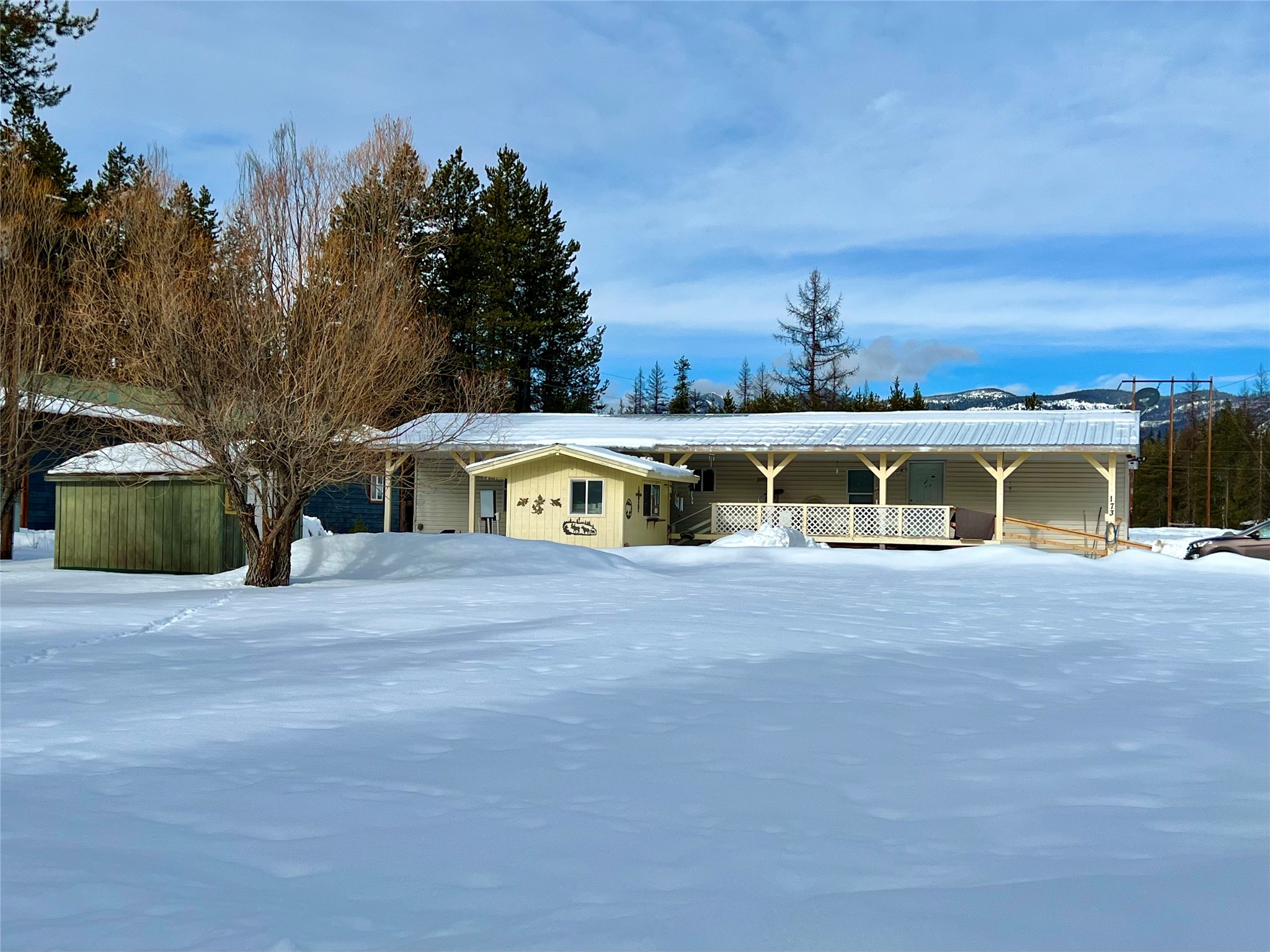 Check out this 2 Bedroom 2 Bathroom Manufactured Home on 1.5 acres in Olney Montana situated between Whitefish and Eureka. This is a well cared for dwelling with a very nice floor plan offering a Bedroom and bath on each end of the home with a roomy open floor plan and a vaulted ceiling in the Living room. Being Located between Down Town Whitefish and Eureka allow for  access to all of the Incredible Amenities Northwest Montana is so well known for. Included in the Photos section are just a few images of many of the Fun recreation choices the area has to offer. If it is Fishing, Kayaking, Golfing, Skiing and Snow Biking, Hiking just to name a few, The options are endless. For More Information about this property please call Trini Carreon at 406 270-6688 or your real estate professional.