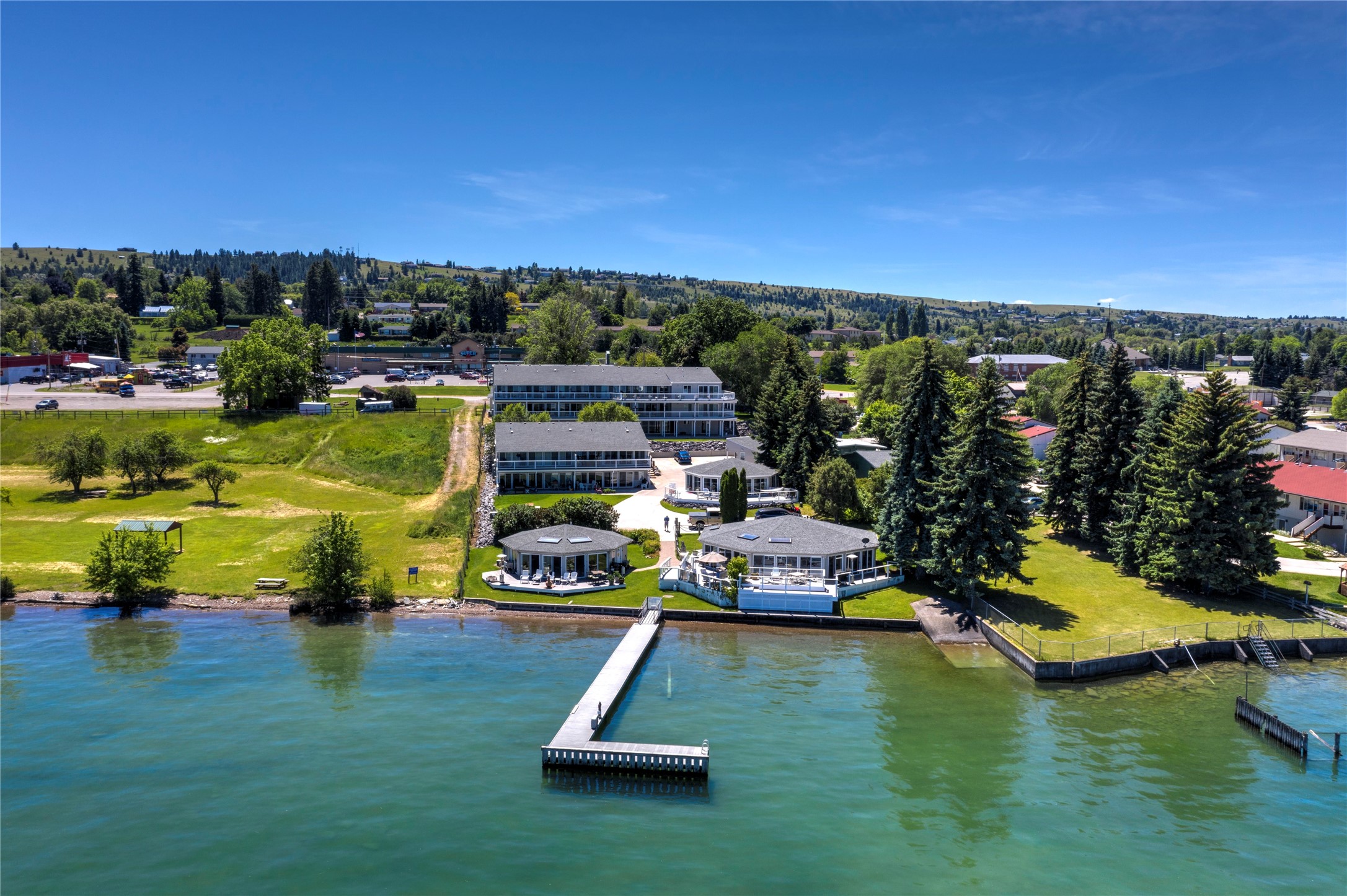 Welcome to your turn-key lakeside retreat at 50300 US Highway 93 B1/32, Polson, MT! This fully remodeled 2-bedroom, 2-bathroom condominium is a gem nestled in the desirable Lake Place Condominiums, offering not just a home, but a lifestyle on the shores of the breathtaking Flathead Lake. Step into a world of modern comfort and style as you enter this thoughtfully renovated condominium.The open floor plan seamlessly blends the living, dining, and kitchen areas, creating a welcoming space for both relaxation and entertaining. With having 130 feet of shared waterfront just steps away. Whether you enjoy water activities, picnics by the lake, or simply soaking in the natural beauty, this location offers it all. Investors will appreciate the property's excellent rental history, making it not only a delightful home but also a smart financial choice. Don't miss the opportunity to own a slice of paradise. Contact Amy Wilson 406-370-9101 or your real estate professional to schedule a showing!