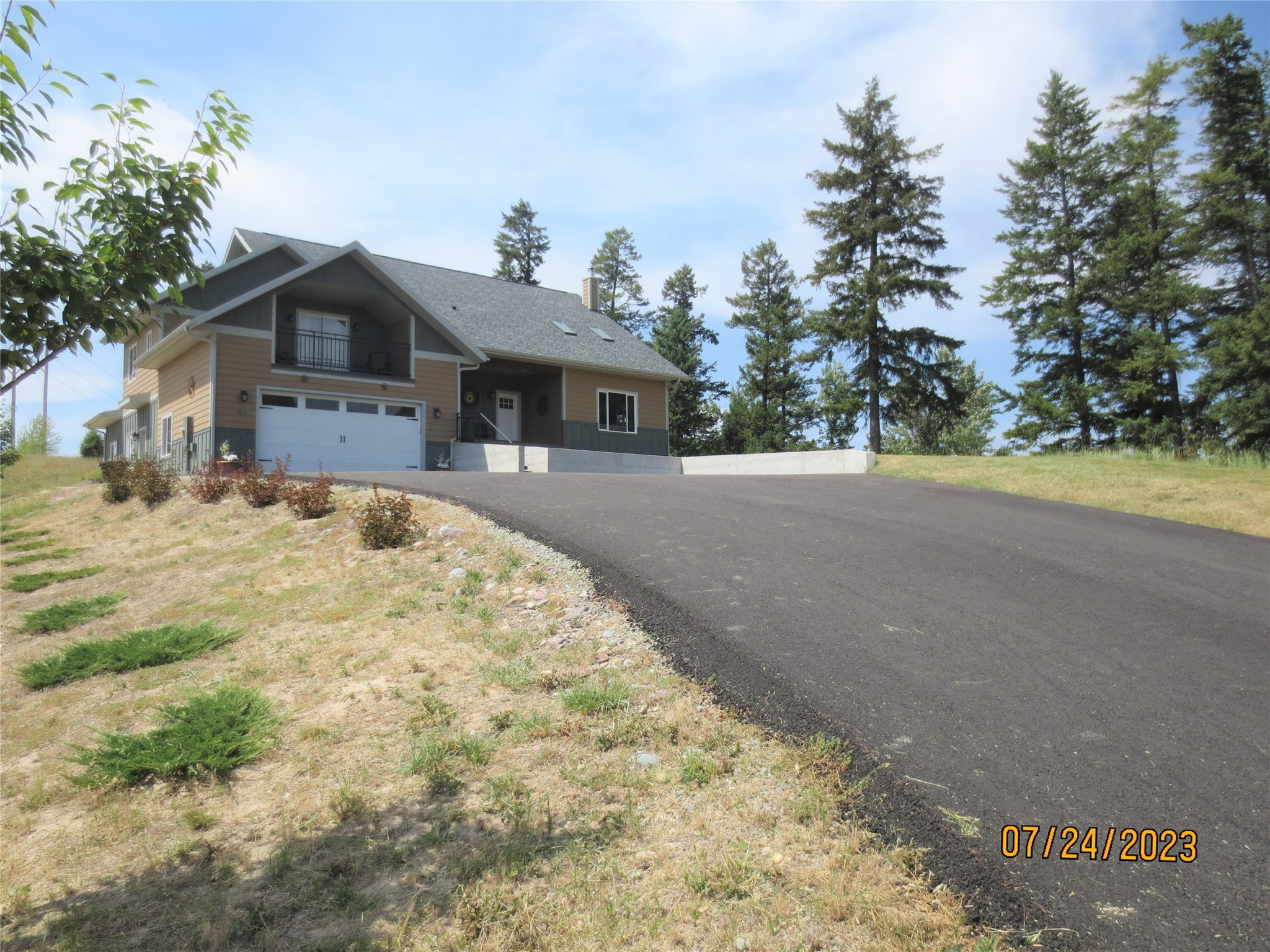Custom 3,980 sq ft home w/beautiful, varied views of Flathead River, Whitefish Mtn resort, the Swan Range & wildlife, from inside & outside of this well-appointed one-owner home! Borders state land on one side & HOA woods on another; yet only 4 minutes driving time into Kalispell. Main floor master bedroom, office & laundry. Upper level great room boasts it's own kitchen, laundry, balcony & exterior view deck ,making an ideal apartment for in-laws, extended stay guests, nanny, etc. 2 zone heat & A/C. Wired/plumbed for sump pump, radon, & 4 zone sound system, if ever wanted/needed. Also includes 9' main floor ceilings, cozy wood stove, custom flooring, custom faux painting, built-ins, solid core doors, reverse osmosis water system, large indoor storage room & green/grow room with it's own sink. Perfect for guests & entertaining, utilizing 4 decks (mostly Trex), large poured patio & new paved driveway. A must see! To preview, call Barb at 406.261.0177, or your real estate professional. Two complete kitchens and laundry facilities: main floor and upper level.
Furniture is negotiable.