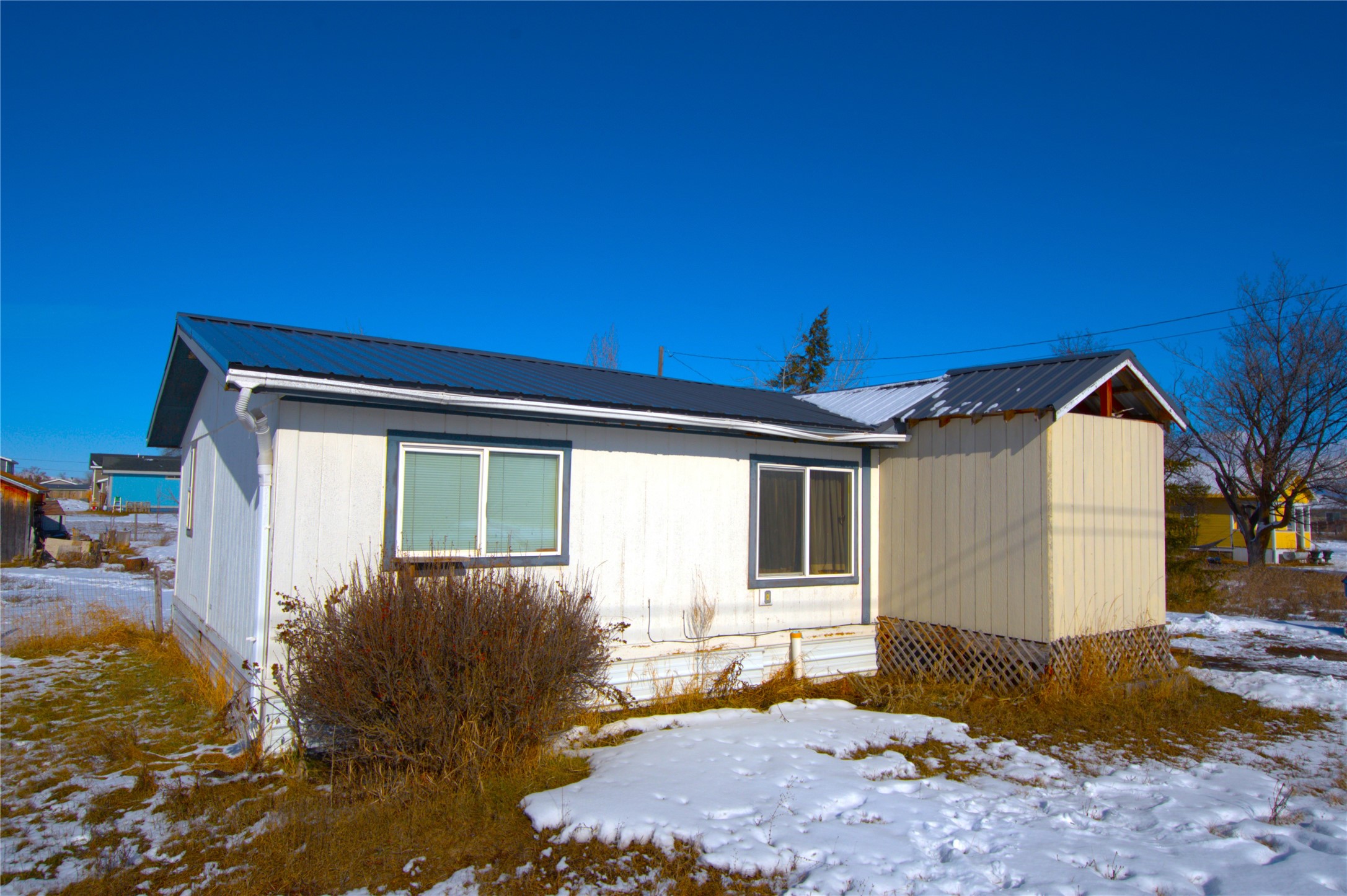 3 bed, 2 bath manufactured home in beautiful Somers, Montana! Across the street from Somers Middle School, and moments from world-renowned Flathead Lake. Home is on a .29 Acre lot, on a quiet residential street with recreational trails and lake access nearby. The home has been de-titled, which may provide more financing options for prospective buyers. To schedule your showing, call Aaron Norton at (406)250-0474 or your Real Estate Professional.