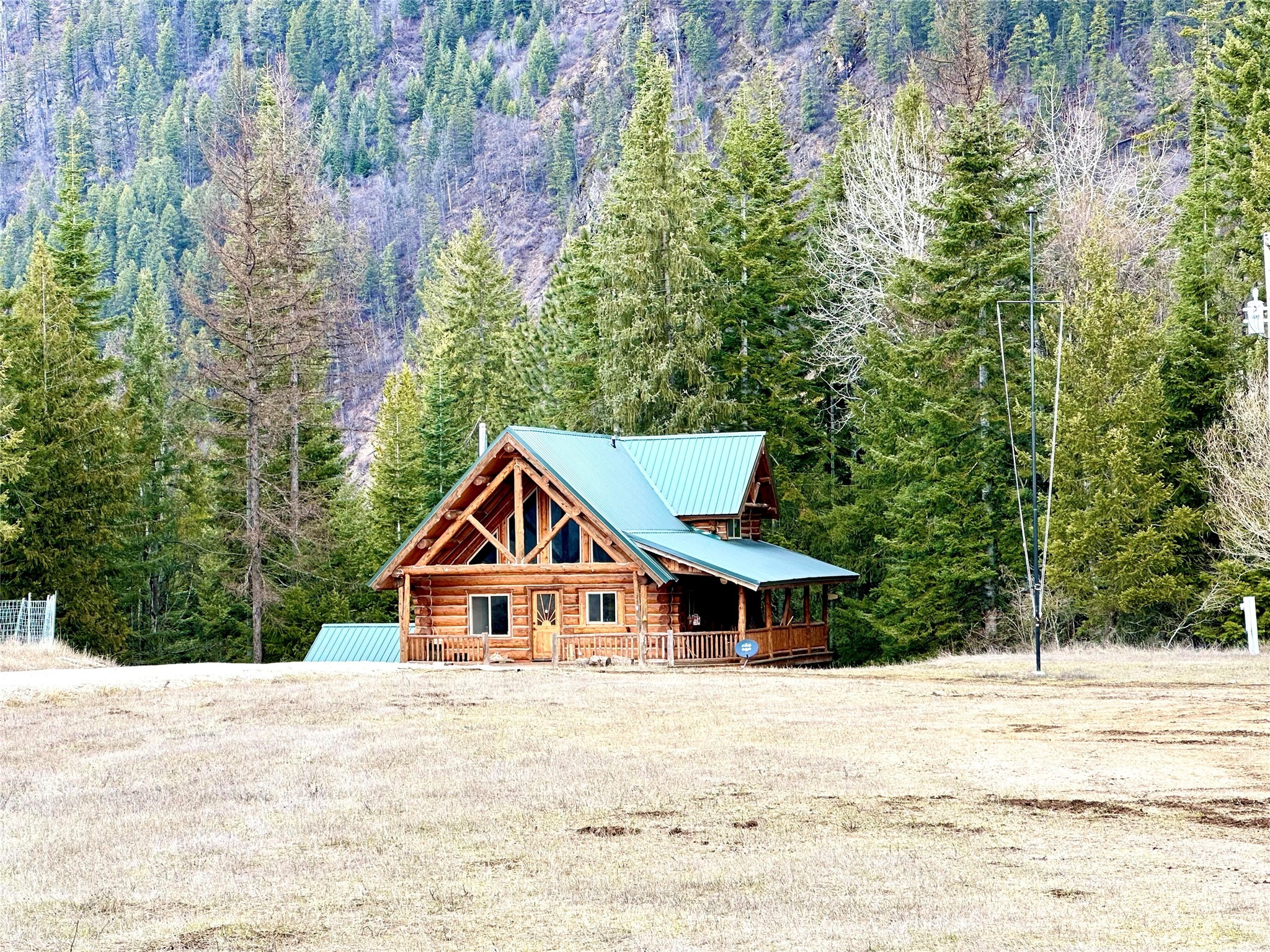 This rural property in the small community of Heron, MT. is situated just a few miles from the MT-ID state line. The property is partially fenced for animals, a fenced garden area, a pole barn for hay, and a storage shed. The log cabin was built in 2015 and has 1 bed/bath on the main level and 1 bed/bath in the upper loft, a full basement that 
 could become more sleeping space, a den, an office, storage,  or whatever you want it to be. The basement can be accessed from inside the house or from outside the house.

MORE PICTURES COMING SOON!!!