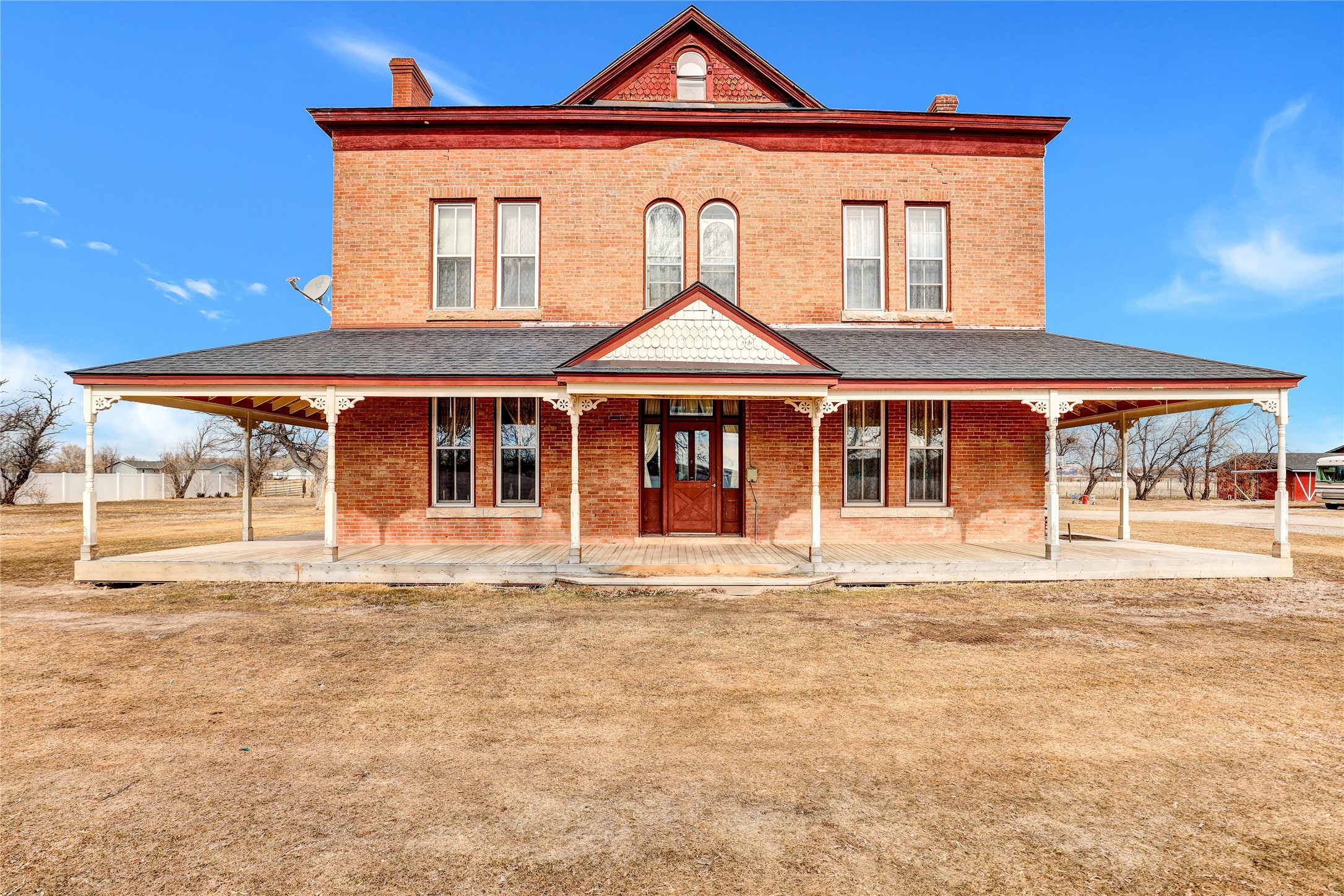 Just a few short minutes from Great Falls, this one-of a kind, 17-acre horse property is a rare find. The historic Vaughn Mansion w/ a winding staircase w/ a hand-carved banister, sculptured ceiling, 3 fireplaces, and the original sandstone brick homestead. The 4300 sq ft home has 12 rooms, including 4 beds, 1 1/2 baths, an updated kitchen with modern amenities, a library, a parlor, dining room, and an office. In the attic, you'll find an incredible playroom and access to the widows walk, where you can enjoy panoramic views of this incredible property. It doesn't stop there! The property boasts a creek, the original barn built in 1890 and lovely views of the Sun River. Recent updates include a new roof on the garage /shop, new horse shelter and shed newer furnace, new hydrants in the pastures. Imagine the possibilities this property has to offer. Whether you're looking for a place to call home, a bed and breakfast, or an urban hobby farm, this is the property you've been waiting for.