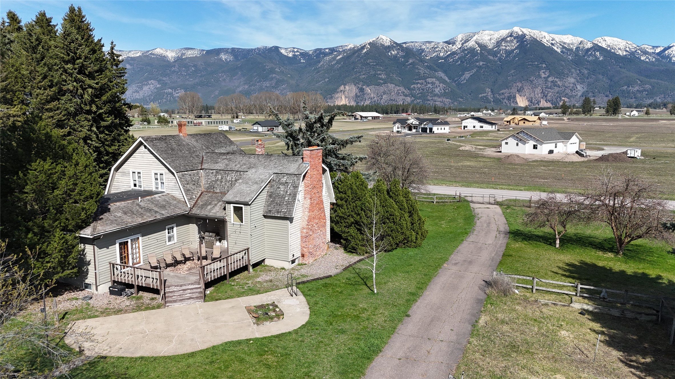 Experience the ultimate equestrian lifestyle in this expansive 22-acre property located in one of the most beautiful locations in the Flathead Valley. This horse lover's paradise features a charming 3-bedroom, 2-bath farmhouse, 5-car garage, guest rental cabin, and additional rental bedrooms within the barn, providing excellent supplemental income.

This versatile property is perfect for horse boarding/training and comes equipped with two indoor arenas, a large outdoor arena, a round pen for training, 18 turnouts for pastures, dry lots, and 5 steel pens for holding horses/livestock.  The additional 80x50ft building can be used for hay, equipment storage, and as an event venue. Over $400,000 in improvements have been made to fencing and property in the past 5 years. Don't miss out on the opportunity to own a rare Montana horse property centrally located in the Flathead Valley.  
Call Michael Johnson at 406-270-4911 or your real estate professional today. Appointment Only.