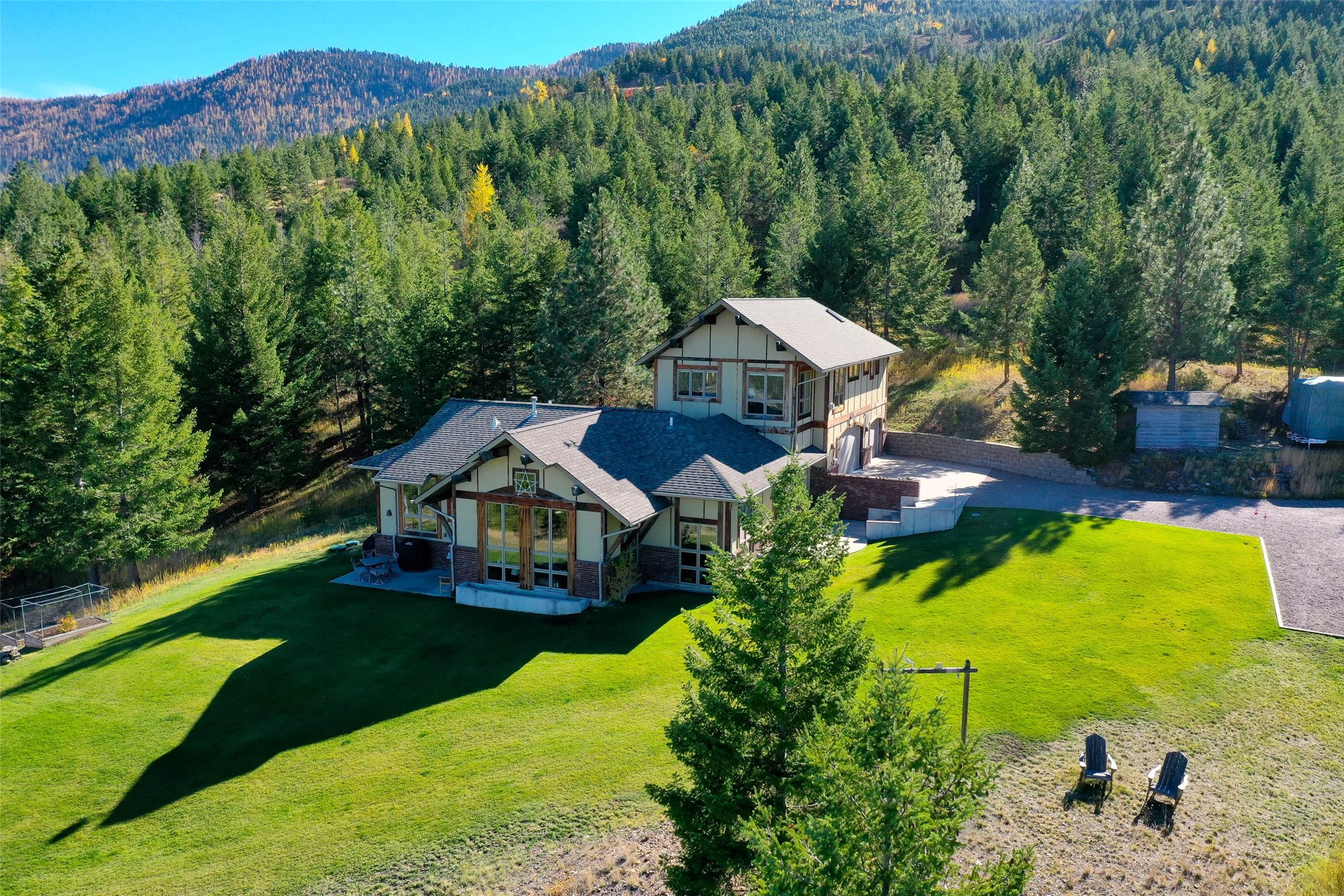 OPEN HOUSE SUNDAY APRIL 7th 12:00-2:00pm.  Come see then!  Pattee Canyon mountain retreat on nearly 6 acres, only 10 minutes from Higgins Ave. Near end of the road privacy with amazing views of the Missoula Valley and Pattee Canyon. This property adjoins Missoula Open Space lands with access onto the popular Barmeyer trail. The original home was built by Scott Ayers in 2003 and Buckley Builders completed the second-floor addition and added garage in 2007. Enjoy the open main floor living with sunken living room and den. Nearly 20 feet tall ceilings with plenty of windows to view from and let the light in.  Lots of built-in storage and closets plus a big three car garage. Perched on the upper level is the primary bedroom suite offering an area you will want to hang out in to read or just take in the views. Modern bath with big walk-in shower and closet. Don't miss the small den and storage room too. The home is comfortably heated by in floor radiant heat.