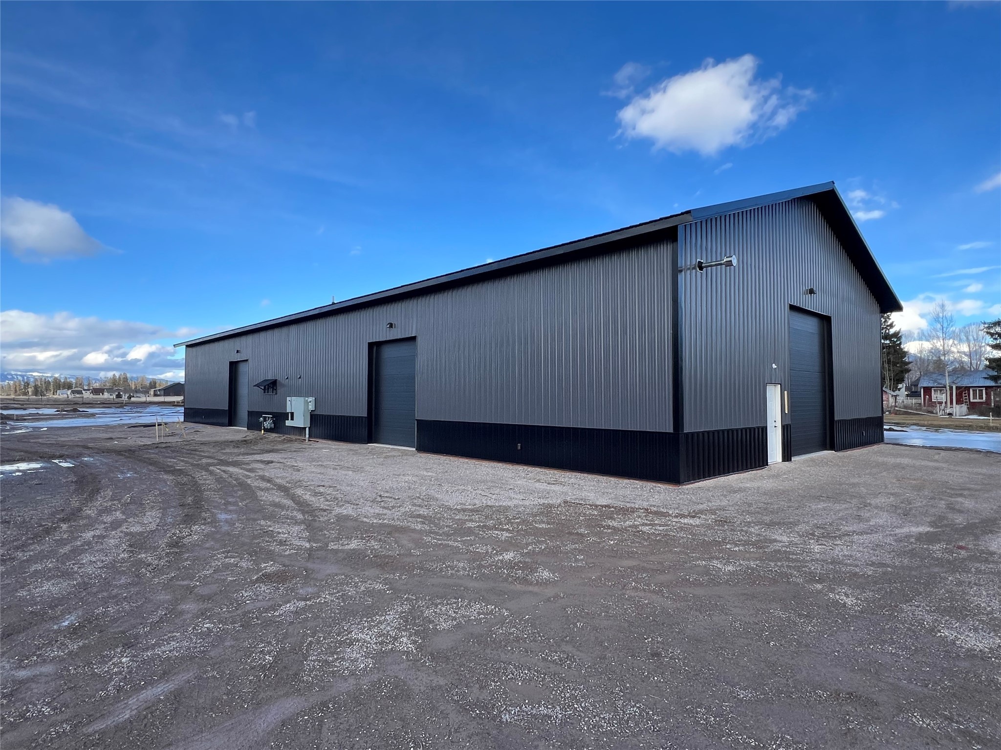 6000 Square Foot (50x120) shop/warehouse space available for lease.  This new development, with access off of Highway 2E and E Reserve, has 6000 SF buildings available as a whole or half building.  375 is a complete building with 2 bathrooms, four man doors, and four overhead doors (2@12x14 and 2@10x12).  The building has metal walls and ceiling interior finishes, 16' walls, gas heater, evergreen water, private sewer, and 400 Amp service.  The development is paved, and set up for tractor trailer circulation and deliveries.  Call Zac Andrews at 406-250-6160, or your Real Estate Professional.