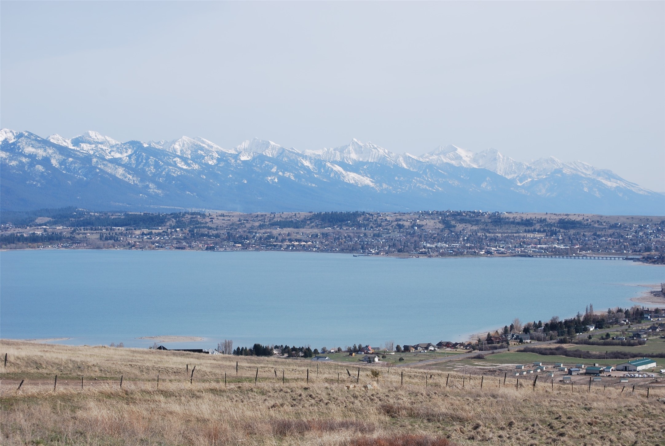 Graze your horses just ten minutes from Polson on this 40 acre tract. Seller financing available. Multiple options for off-grid home-sites on this legacy property.  Access Tribal Conservation lands across the upper boundary.  Gently sloped terrain with unbeatable, expansive  views of  Flathead Lake, the shimmering lights of Polson with the backdrop of the Mission Mountains.  Call Dennis Duty 406-885-3731, Mac Swan 406-253-0855 or your real estate professional.
