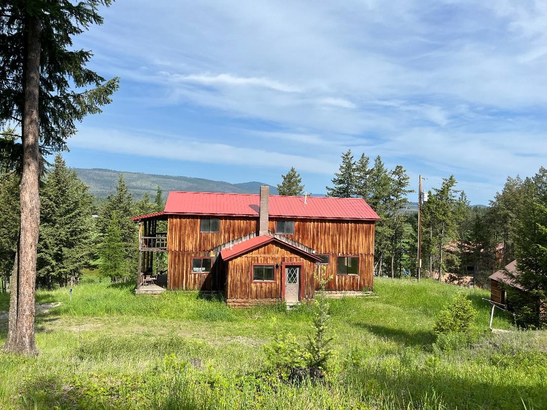 How would you like to live in the beautiful West Kootenai area of NW Montana? Here is your opportunity, check out this 3 bedroom  home on almost 3 acres of treed property nestled up next to thousands of acres of Kootenai National Forest. Property has on the grid power, it's own well and septic system. High Speed fiber optic internet is available! There is a spacious entrance, brand new Kitchen Cabinets, large dining room and adequate space in the living room as well ! New floors and a partial remodel makes this home ready for You! Less than a mile to the West Kootenai Amish store where you can buy groceries, fresh bread, homemade doughnuts and even  breakfast on Sat mornings ! Relax on the covered deck and enjoy the views and watch the deer and turkeys. Contact Gideon Yutzy at 406-261-1246 or your Real Estate Professional