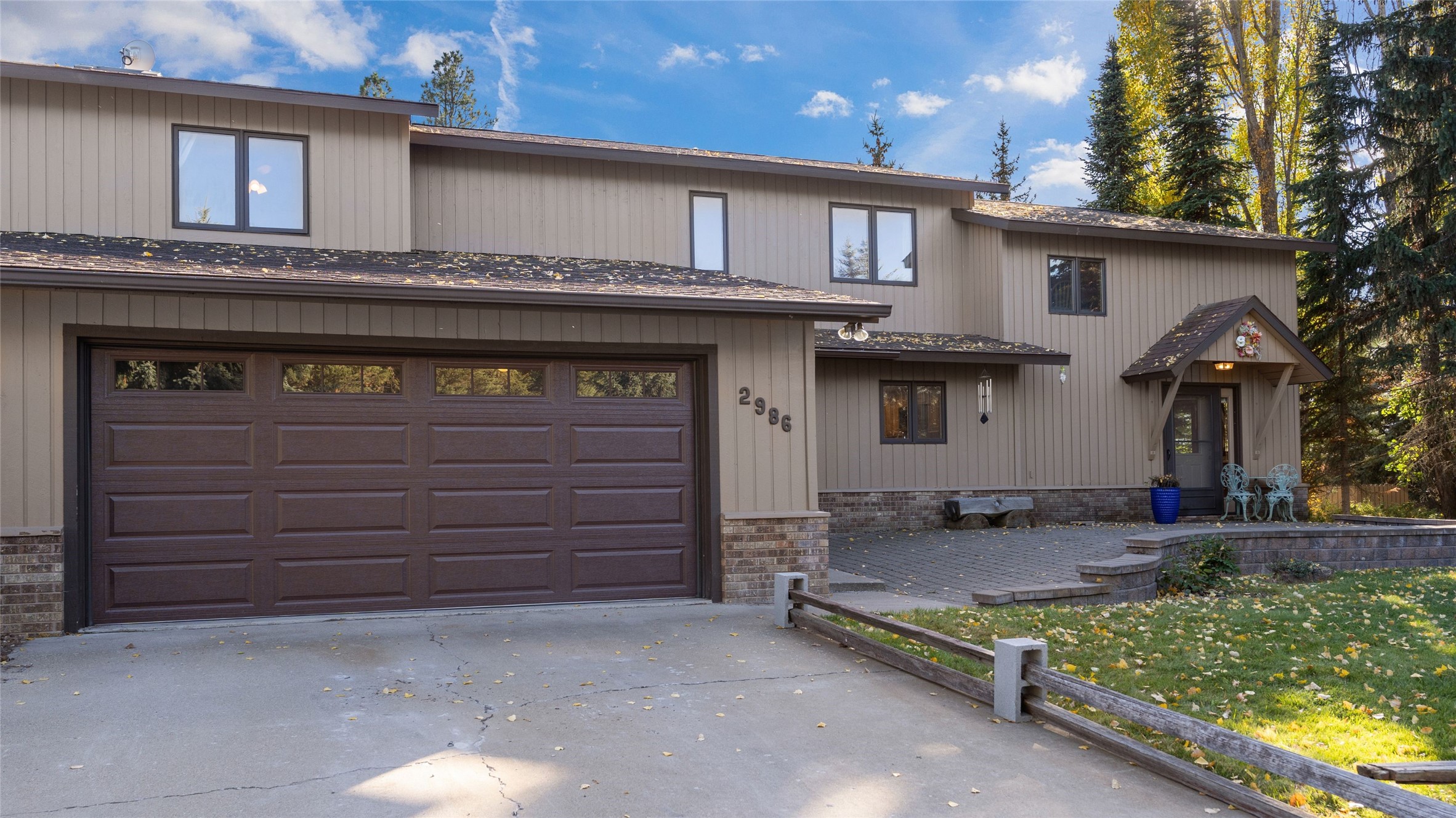 Wow, if you are seeking tranquility close to town you will love this townhome on a rare 1/2 acre+ lot off of Whitefish Stage Road. This home is conveniently located between Kalispell and Whitefish with private community access to Whitefish River. This home features a wood burning fireplace, wood burning stove, and a newly installed heat pump offering multiple heat sources for the Winter months. The main kitchen has been beautifully remodeled and opens to your vaulted dining room and living space featuring tongue and groove ceilings. You will enjoy the convenience of the attached oversized 2 car garage for your seasonal toys along with the additional parking pad for your RV or boat. While labeled as a condo in county records, this home and HOA operate similar to a townhome with minimal dues and individual responsibility for maintenance. Call Janet Cantrell at 406-890-5390 or your real estate professional.