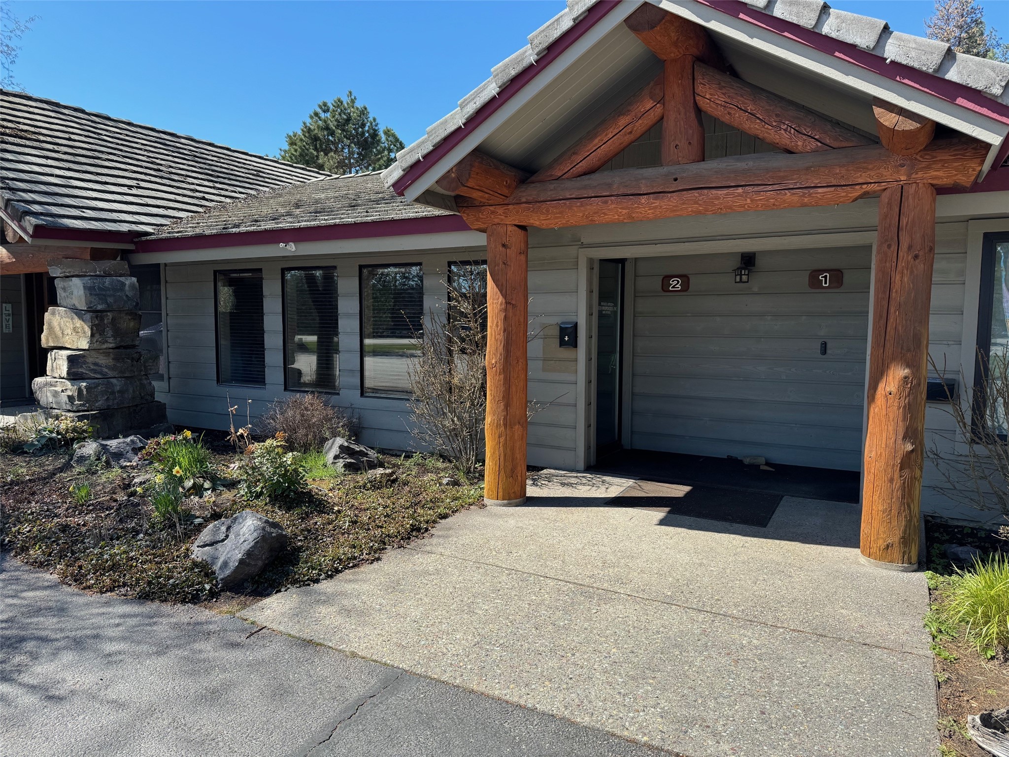 Excellent business location off Mt Hwy 35 with visible Hwy signage, available parking, and easy access to your own unit. The space has a large open area upon entry with one separate office with a viewing window into the main area. Office includes a half bath with storage shelves and a back door to access the rear yard and common area space. The built-in desks and cabinetry will stay.  B-2 Zoning allows for multiple uses.  To schedule a showing contact Rebecca at 406.890.1223, or your real estate professional.