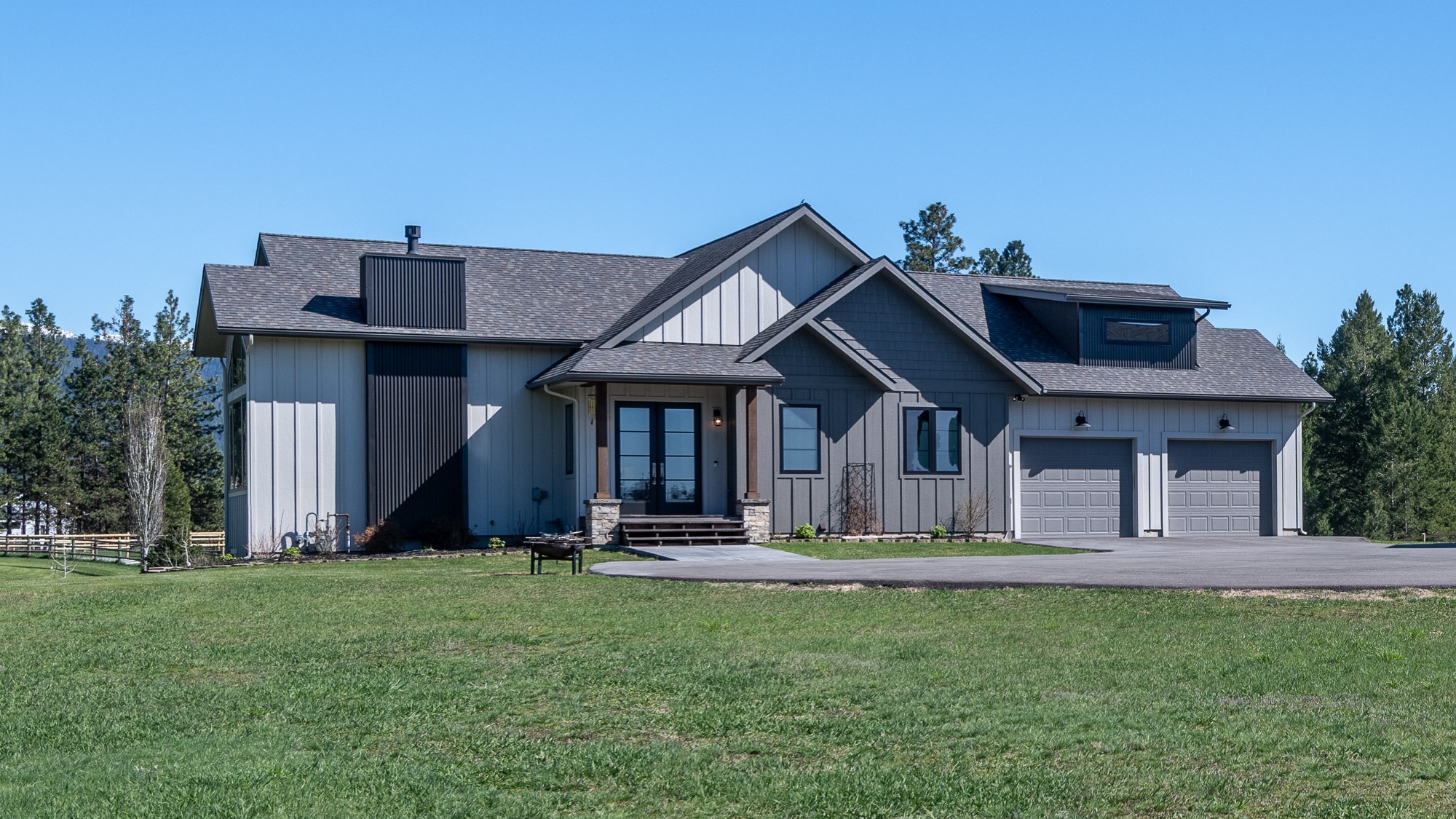 Beautiful Custom Built Home in Creston on 2.37 Acres w/Stunning Close-up Mountain Views! 4528 sq. ft. (2) Primary BR Suites plus (3) guest bedrooms, (2) add'l bathrooms, office nook & storage space galore. Each level offers an open floorplan w/(2) complete kitchens and laundry rooms. This home is perfect for multi-generational living. The main level presents a true Chef's kitchen w/butlers pantry, custom island by local craftsman, Bosch appliances, gorgeous granite and plenty of natural light for a bright & cheery atmosphere. Living area has a lovely vaulted ceiling w/custom open beams, gas fireplace & spectacular mountain views! Also on main level is a spacious entry foyer, primary BR suite, guest BR, guest BA, office nook, laundry, mud room (adjacent to garage). Relax on the huge covered deck or patio facing the mountains. 28X48 SHOP w/double lean-to's, 220 pwr., full RV hook-up. See doc's for more info! Call Shelby 406.253.0222 or Mike 406.871.0673 or your real estate professional.