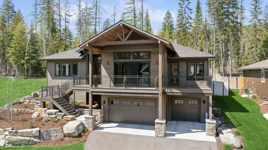 Custom Whitefish home just minutes from downtown, golf courses and the lake! Newly built in 2020 it has 4 Bedrooms, 2.5 baths with a floorpan great for many guests. Perched on a quiet street facing Whitefish Mountain Resort, relax on the front deck with those views! Meticulously maintained inside and out you will enjoy the interior just as much as the exterior in every season. The 3 car oversized garage is heated, finished and has plenty of room for vehicles and toys, as well as an additional space that could be finished to your liking as another hobby room, theater or rec room. Call TYLER WARBURTON 406-270-0080 or your real estate professional.