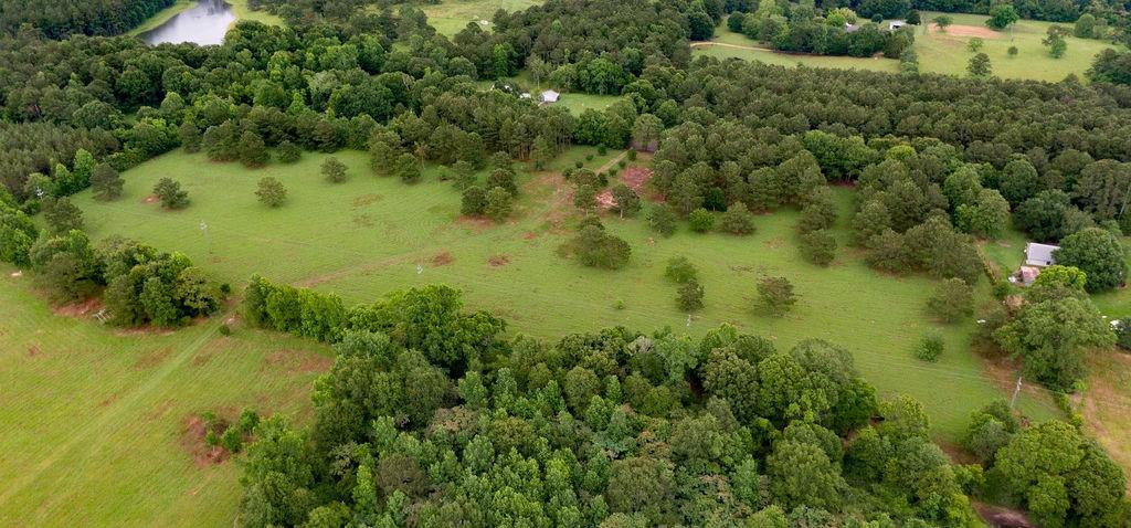 Your 'Slice of Heaven' on over 10 glorious acres with oak lined driveway already in place is waiting for your dream home! Enjoy country life on this beautiful high and dry cleared acreage with many gorgeous scattered hardwoods in the beautiful peaceful hills of "Middle Road". Minutes from Barkers Corner and downtown Folsom. Don't miss the drone video!