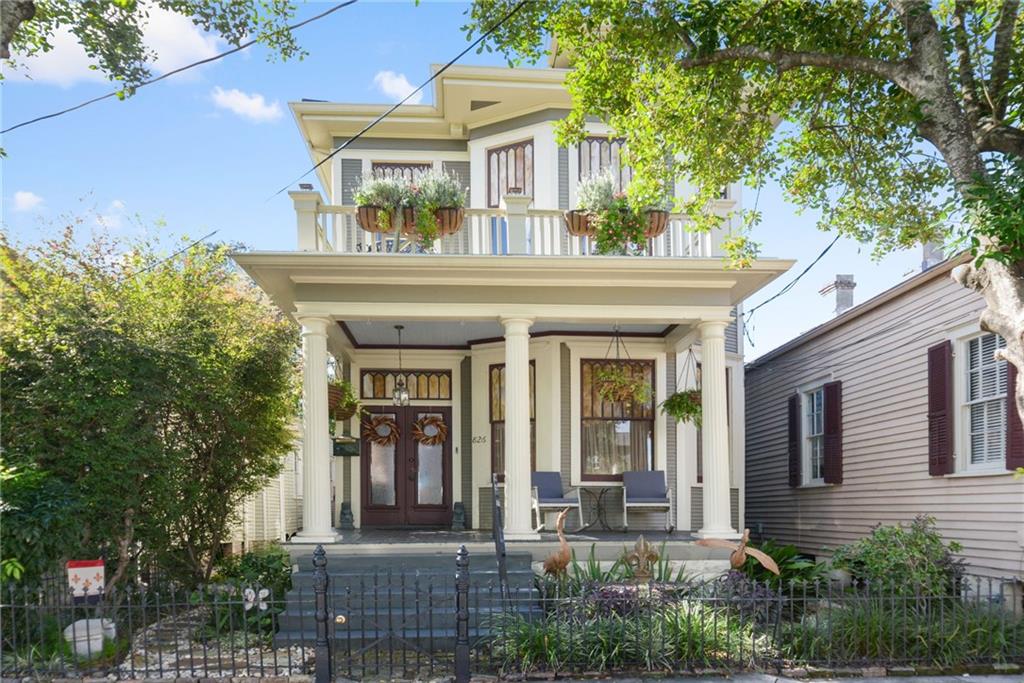 This classic Victorian home exudes historical character and craftmanship.  The moment you step through the front doors you are welcomed by a custom, hand painted mural in the foyer, working pocket doors to the formal parlor and an archway with columns to the dining room, both outfitted with fireplaces and mantels, and a grand staircase with an impressive newel post and banister. 
The oversized windows with meticulously maintained trim bathe the heart pine floors in natural light.  

The just completely renovated kitchen offers plenty of storage and workspace with all the modern amenities while blending into the charming look of the home.  Upstairs offers either 3 bedrooms with one bedroom as a walk-through or create an additional living space off the primary suite and still have 2 large bedrooms.  The front primary bedroom offers a special bay area with stained glass windows and both bedrooms feature balconies, just 2 of the 4 outdoor spaces.  You can also watch passers by from your deep front porch or relax in the low maintenance backyard with new artificial turf.

This special home is nestled in the enticing Marigny Rectangle, just blocks from Frenchmen St, the one and only French Quarter, the artsy Bywater, Crescent Park and the Mississippi River.

Interactive video walk through available here:https://my.matterport.com/show/?m=HWCdjT4MmTc&brand=0&mls=1&