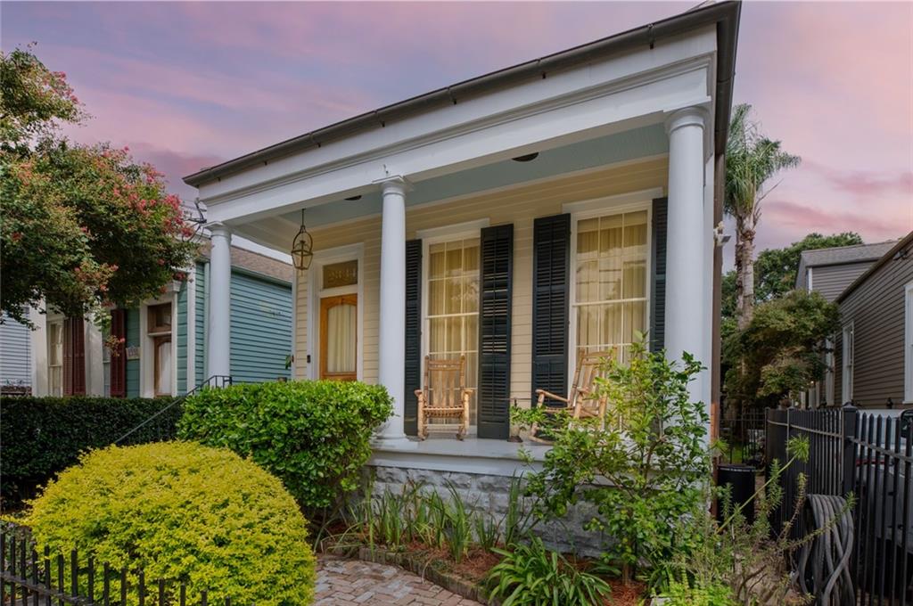 OPEN SAT. 11-23, NOON-2pm. STEP INTO THIS BEAUTY AND EXPERIENCE THE “WOW!”  AN IMPRESSIVE, CHARMING & MEMORABLE SLICE OF HISTORIC NEW ORLEANS ARCHITECTURE.  
This CLASSIC SIDE GALLERY connects interior to exterior! Your windows and doors open to a spectacular span of covered porch overlooking the gardens, outdoor kitchen, courtyard, gazebo and workshop. Enjoy fabulous spaces for your daily living - and for memorable entertaining. You and your guests won’t want to leave!

Downstairs is a dream - open living-dining-kitchen, a second den, two bedrooms, gorgeous spacious marble bath. Escape to your cozy, stylish primary suite upstairs with two closets and marble bath. 

This Quintessential Side Gallery Camelback with modern amenities is in the HEART of Historic Irish Channel, steps from a fabulous strip of Magazine St. Walk to NOLA's favorite Restaurants, Boutiques, Bars, St Paddy's Day Parade, etc. 

Beautiful details - wide pine floors, mantels, brass doorknobs, gas lanterns, high ceilings. Whole house water filter and treatment systems! Too much to list; DON’T MISS THIS GEM!