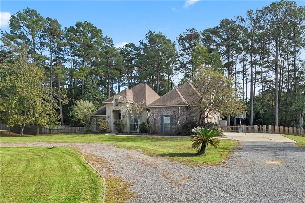 424 Secluded Grove Loop, Madisonville, Louisiana image 1