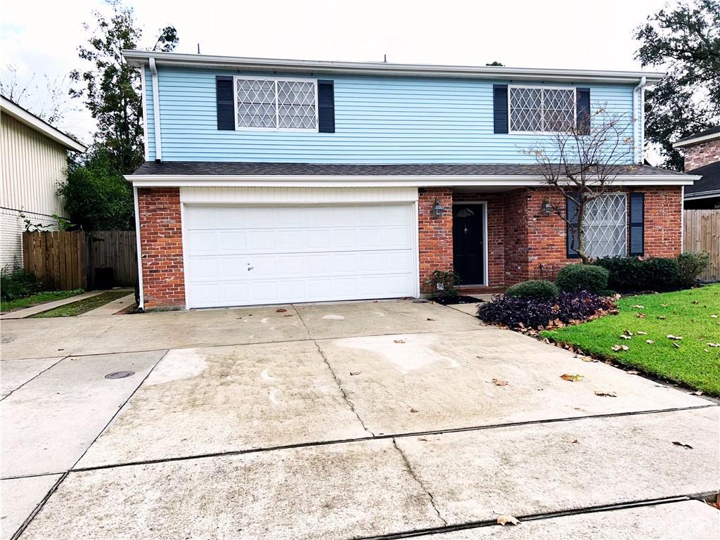 PRICE REDUCTION! DO NOT HESITATE! YES you have found it.  This home has been meticulously maintained with tons of upgrades and improvements.  Within blocks from the levee, on a quiet serene street.  No neighbors across the street with plenty of parking for when you are entertaining.  This home features all new flooring upstairs with no carpet and boasts 4 large bedrooms.  The open concept kitchen is great for Holidays and Entertaining.  The brand new electric fireplace has built in storage behind it, WHAT! Wait until you see the park like backyard with brick patio and subsurface drainage.  Another great feature is the Electric Panel is wired for the Tri-Fuel Generator that runs the upstairs HVAC, all lights and Fridge.  Sleep well during our Storm season knowing you wont be left in the dark.  Get with your agent or call me ASAP, this beauty will not last long. Open House 6/19/25-5pm to 7pm and 6/21/25 1pm to 3pm.  Must see to understand the beauty and comfort this home brings.