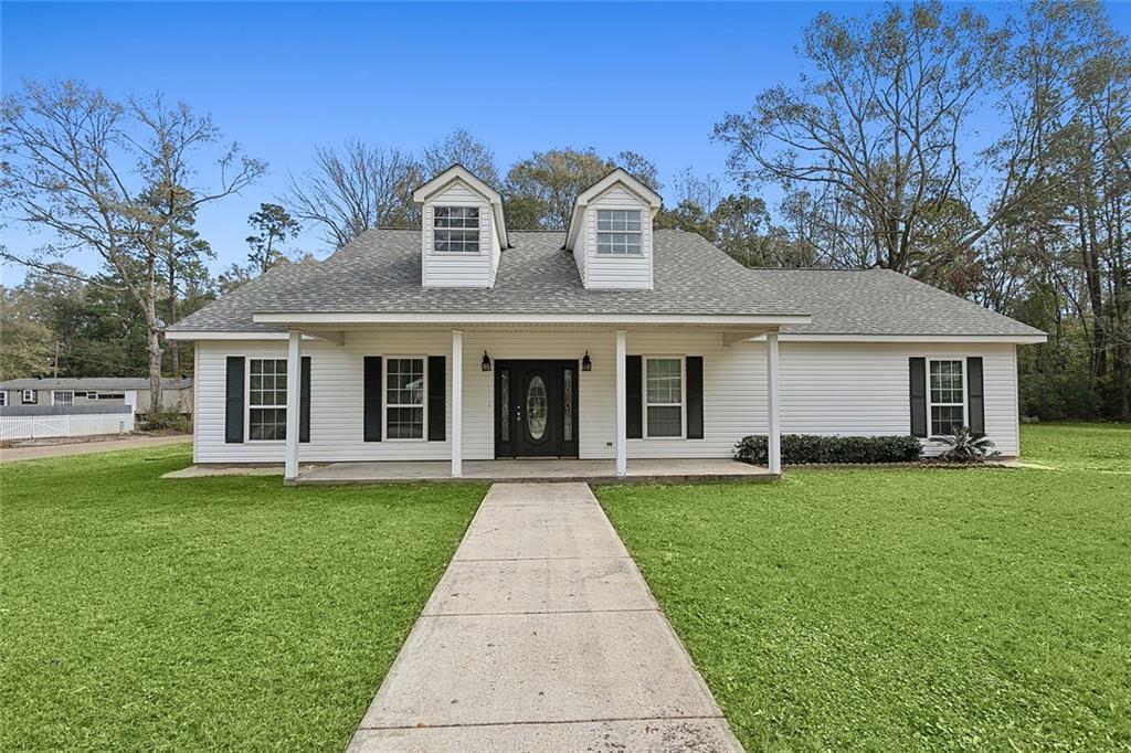 Come Home to this Beautifully Renovated Acadian Style Home on Desirable Corner Lot. New Roof, New Appliances, New Quartz Countertops, New Carpet, Some New Windows, Fresh Paint Throughout, Plus So Much More...this Home has it ALL! Relax in your large Living Room in Front of your Gas Fireplace, or cook in your Spacious Kitchen with Beautiful Countertops, Cabinets and Farmhouse Sink.  Enjoy your huge Bonus Room perfect for Home Office, Play Room, or just Additional Living Space. Primary Bedroom and 2 additional Bedrooms downstairs with one Bedroom Upstairs. Adjacent Lot 3 is NOT included in Sale, but can be purchased for an additional $20,000. Bond for Deed will be considered with 10% down and interest rate of 2% above prime. Make your Appointment Today, this Property will Not be on the Market Long!