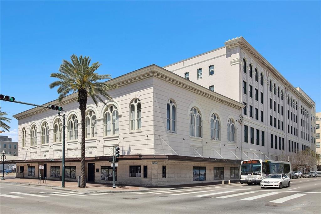 Live in the heart of it all with this spacious and light-filled 1 bed, 1 bath condo ideally located between the Medical Corridor, Central Business District, and French Quarter. Situated in the iconic Krauss Building, this unit features soaring 12' ceilings, gorgeous wood-look ceramic tile floors, recessed lighting, and large arched windows with custom shades that fill the space with natural light. The open-concept kitchen flows seamlessly into the living area and includes stainless steel appliances, while the bathroom features modern tile finishes and a custom glass tub enclosure. A washer/dryer combo is conveniently located in-unit.

BONUS: Seller is covering the first month of HOA dues!

Enjoy resort-style living with top-tier building amenities, including a rooftop saltwater pool, fitness center, residents lounge, spa, business center, concierge, 24-hour valet and security, and even a dedicated indoor dog walk area—perfect for pet lovers. Surrounded by cultural landmarks like the Saenger and Joy Theaters, you're just a short stroll from world-class dining, nightlife, and everything downtown New Orleans has to offer.

Don’t miss this rare opportunity to own a turn-key condo in one of the city’s most vibrant and walkable neighborhoods.