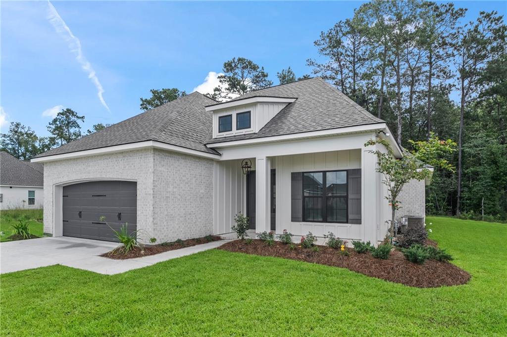 1169 Fox Sparrow Loop, Madisonville, Louisiana image 1