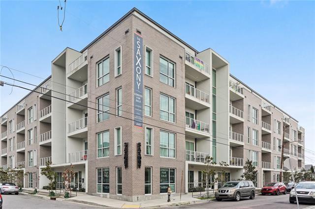 Luxury penthouse living in the heart of the Bywater at The Saxony Condos. Just steps from Crescent Park and minutes to the French Quarter, this 2-bedroom, 2-bath residence offers sweeping views of the Mississippi River from two private balconies—one off the living area and one off the primary suite.

The bright, open floor plan features oversized windows, high ceilings, and a calming, neutral palette. The kitchen is equipped with a gas range oven, quartz countertops, and a breakfast bar that seamlessly connects to the living room—perfect for both everyday living and entertaining.

Additional highlights include an in-unit washer and dryer, gated and secure parking, and access to a full suite of upscale amenities: resort-style pool, outdoor kitchen, fitness room, meeting room, lush courtyard, dog walk area, secure bike storage, and more.

The condo fee covers gas, water, garbage, exterior insurance and maintenance, and professional property management.

Enjoy low-maintenance luxury in one of New Orleans’ most vibrant and walkable neighborhoods.