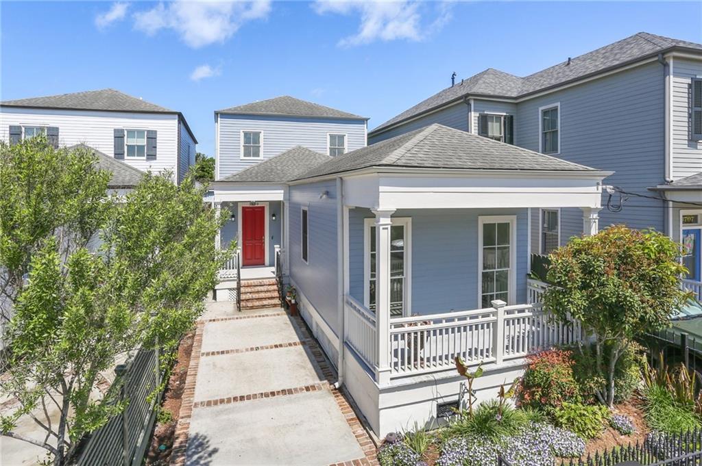 Nestled in the heart of Uptown, this meticulously crafted 3 bedroom/3.5 bath home was built in 2017, and seamlessly blends contemporary design with nods to historic charm. Featuring 10 foot ceilings and heart pine floors throughout, the layout was designed with entertaining in mind. From the front porch, you enter the spacious foyer which leads to an oversized living room. Adjacent to the living room is a large dining room and a beautiful chef's kitchen with high end appliances, marble counters, and ample storage and workspace.

The primary bedroom suite, conveniently located on the first floor, offers a serene retreat complete with a generous walk-in closet and a luxurious bathroom featuring a soaking tub, separate walk-in shower, and dual vanities. Adjacent to the primary suite is a private porch, providing a tranquil retreat for morning coffee.

Upstairs is a cozy study area, two sunlit bedrooms, each with its own en-suite bath, and a convenient laundry room. Outside, the enchanting deck with a gazebo and the landscaped yard with pavers create the perfect backdrop for outdoor enjoyment. Additionally, gated off-street parking for two cars ensures both convenience and security. The home features upgrades including a Lutron lighting system and built-in surround sound speakers, ensuring an elevated lifestyle experience.

Ideally situated just moments from Magazine Street and the vibrant Brewery Row of Tchoupitoulas St., this residence offers unparalleled access to the dynamic offerings of Uptown living. Impeccably maintained and move-in ready, this home presents an extraordinary opportunity to embrace the essence of Uptown living at its finest.