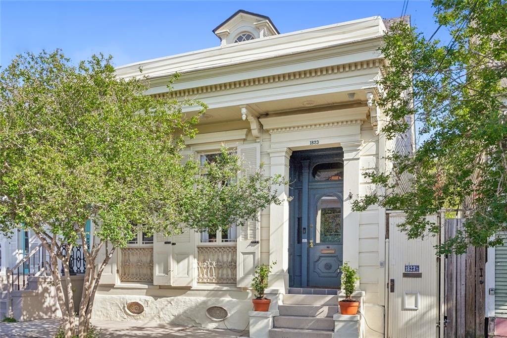 **OPEN HOUSE SATURDAY APRIL 20th from 11-1PM** Welcome to your dream home in the historic Marigny Triangle! This stunning Creole Cottage circa 1850 was recently revitalized to perfection by a local architect. The owners unit features an open living and dining area that is thoughtfully designed to maximize space and light, and seamlessly flows via french doors to the elegant and efficient chef's kitchen. Exposed brick & post walls lead to soaring 11-foot ceilings alongside beautiful bleached hardwood floors. On the lower level, discover an inviting guest bedroom and stylish full bath, while the upper level boasts a luxurious primary suite with impossibly chic bathroom, offering a private retreat after a long day. Also upstairs, you'll find a convenient walk-in laundry along with a practical office alcove for remote work or creative pursuits. Every corner exudes character and sophistication! The income-producing 1 bed, 1 bath back unit is currently being used as a lucrative Airbnb/midterm rental but would also be perfect for a long term tenant or as a guest suite. Or convert it into a large three bedroom single family home - whatever best suits your needs!

Whether you're looking to generate passive income by renting out the adorable back unit, or envisioning a grand three-bedroom single-family conversion, the possibilities are endless in this versatile and enchanting property. Don't miss the chance to experience the timeless charm and modern amenities of this captivating Creole cottage—schedule your showing today and step into a world of refined living.