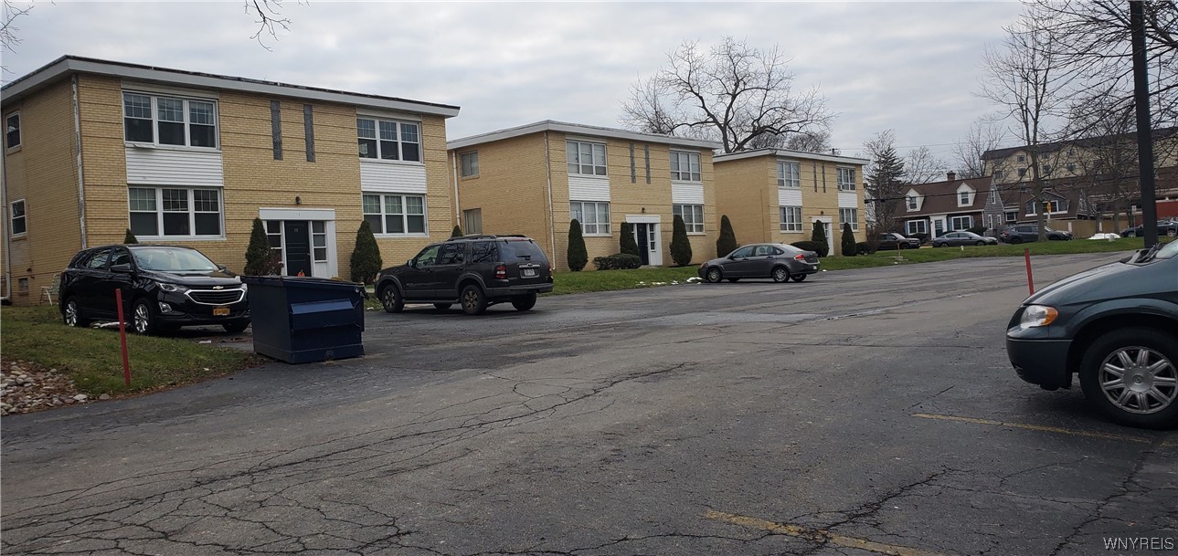 Available immediately is a rear opportunity to own a 12 unit brick apartment assemblage in the heart of Western NY's most walkable Village and WNY's most populous and affluent Town. Three adjacent 4 unit buildings are just southwest of Union Road (NY 277) and a couple hundred feet from Main Street. Within a short walk are Tops Market, Walgreen's, tons of local and chain restaurants, several banks, and churches. The site is three blocks from the I-290 access at Main Street. There is paved parking in front for 20 cars. The property is wildly under-rented with its 12 units averaging only $820 per month.