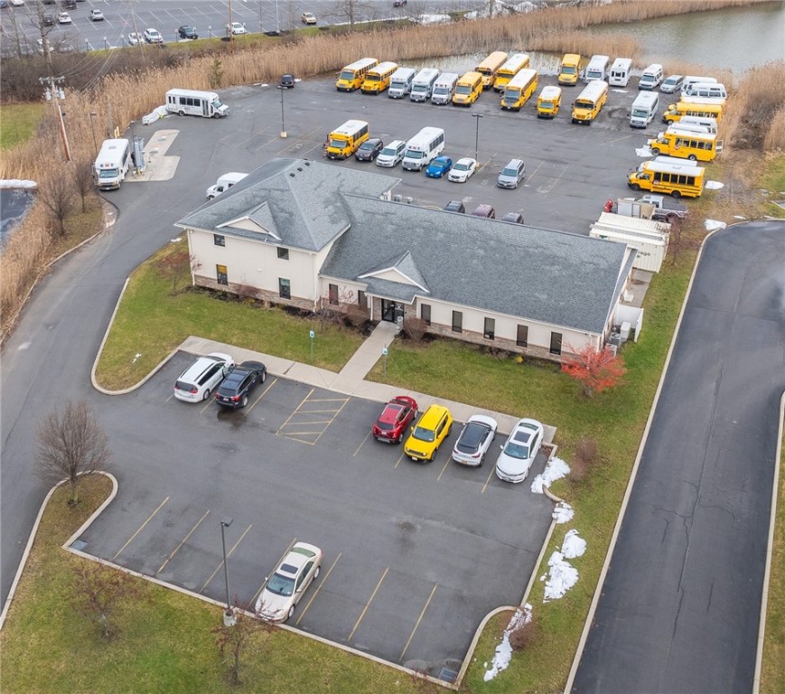 ABSOLUTELY FABULOUS FREESTANDING (2011 Built) BUILDING FOR SALE ON 2 1/2 acres!* OVER 3,000 SQFT of MULTIPLE OFFICE SPACE ,including large open space  and 2 bathrooms* WAREHOUSE/GARAGE  is over 1600 SQFT,20ft high , 2 Bay 14 'overhead doors* AMPLE 150 + car PARKING* 10,000 GALLON IN GROUND FIBERGLASS TANK*BEAUTIFULLY MAINTAINED ALLOWS you to MOVE IN & FOCUS ON YOUR BUSINESS*IDEAL FOR SO MANY USES: FLEET MAINTENANCE , RETAIL,OFFICE,SHOWROOM,HVAC,CONSTRUCTION< IDEAL LOCATION NEXT TO RIT,INTERSTATE 390, THRUWAY * Owners are moving only  because they are growing and need more space* Ideally the owners would like to rent back for a while