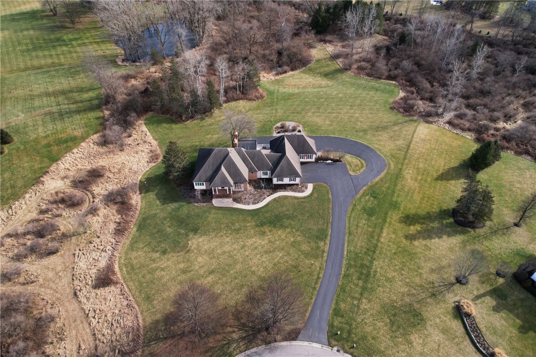 *** OPEN HOUSE THURSDAY, 2/15, from 4:30 PM - 6:00 PM *** ALSO, SATURDAY, 2/17, FROM 11:00 AM - 12:30 PM*** EXCLUSIVE WINDHAM HILL! SPRAWLING EXECUTIVE RANCH PERFECTLY SITUATED AT THE END OF A CUL-DE-SAC ON 3 ACRES IN MENDON** OFFERING ALMOST 4300SQFT WITH AN ADDITIONAL 1764 SQFT IN THE FINISHED WALKOUT LOWER LEVEL** FEATURING 4/5 BEDROOMS, 3 FULL BATHS, 2 HALF BATHS, 4 WOOD BURNING FIREPLACES* 6 CAR GARAGE, 2 ARE HEATED AND FINISHED* TRULY A CAR ENTHUSIAST'S DREAM COME TRUE! CRAFTSMANSHIP IS EVIDENT IN EVERY TURN. GLEAMING HARDWOOD FLOORS**EXQUISITE CROWN MOLDINGS, MANTELS & BUILTINS* COOK'S KITCHEN W/WHITE CABINETRY, HUGE WALK-IN PANTRY, HEARTH ROOM W/WOOD COFFERED CEILING* SPACIOUS OWNERS SUITE W/WALK-IN CLOSETS, LOFT, OPEN TO DECK* PRIVATE ENTRANCE ALLOWS FOR IN-LAW, NANNY QUARTERS, STUDIO OR PRIVATE OFFICE**1ST FLR LAUNDRY* WALKING DISTANCE TO LEHIGH VALLEY TRAIL* DON'T BUY OR BUILD UNTIL YOU'VE TOURED THIS PROPERTY! SQUARE FOOTAGE MEASURED BY APPRAISER. HOA $291.00 FOR THE YEAR 2023 FOR MAINTENANCE OF CIRCLES & ENTRANCE TO WINDHAM HILL. ALL OFFERS ARE DUE MONDAY, 2/19, AT 5:00 PM. DELAYED NEGOTIATION TUESDAY 2/20 AT 9:00 AM.