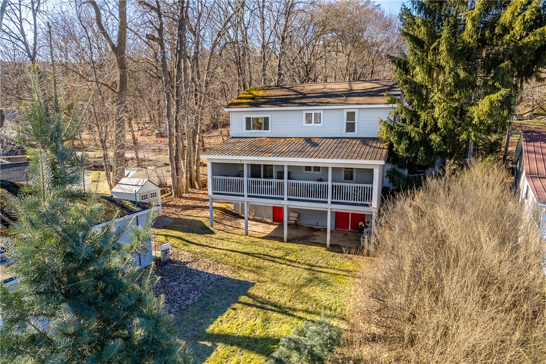 OPEN HOUSE: SAT 4/6 & SUN 4/7 12 NOON - 2 PM - AMAZING CONESUS LAKE....32' LEVEL WATERFRONT....STONE SHALE BEACH! SPECTACULAR 180 DEGREE PANORAMIC VIEWS! VIEWS TO THE NORTH, EAST & SOUTH!  TWO LIVING AREAS: 1ST FLOOR SUITE FEATURES WATERFRONT LIVING ROOM THAT OPENS TO THE EXPANSIVE COVERED PORCH! OPEN TO THE KITCHEN, THREE BEDROOMS & ONE BATH-PLUS AN OFFICE..ALL ON THE FIRST FLOOR! 2ND FLOOR SUITE FEATURES: LIVING ROOM WITH ADJACENT KITCHEN WITH ELEVATED VIEWS OF CONESUS LAKE ALONG WITH THREE OTHER BEDROOMS & BATH! TWO LAUNDRY AREAS TOO! BRING FAMILY & GUEST....ONE LEVEL FOR EACH OF YOU TO ENJOY EACH WITH A SEPARATE ENTRANCE! TOTAL OF SIX BEDROOMS & TWO BATHS...WOW....GREAT AS A POTENTIAL LAKE RESORT RENTAL TOO! LOWER WALK OUT LEVEL HAS LOTS OF STORAGE & AN EXERCISE AREA WITH ROOM FOR EXPANDABILITY! MANY UPDATES! ENJOY WATERFRONT LIVING DIRECTLY ON THE LAKE! PLUS GREAT PARKING AREA & POTENTIAL ROOM TO BUILD A GARAGE TOO! PRIME LOCATION AT THE END OF SUTTON POINT NORTH! SHORT DISTANCE TO GENESEO (SUNY GENESEO) & LAKEVILLE WITH GREAT RESTAURANTS & SHOPS! EASY ACCESS TO RT 390 TO ROCHESTER & ENTIRE FINGER LAKES REGION! AMAZING VALUE! OFFERS TO BE DUE 4/9/24 @ 1P. UNDISCLOSED MINIMUM.