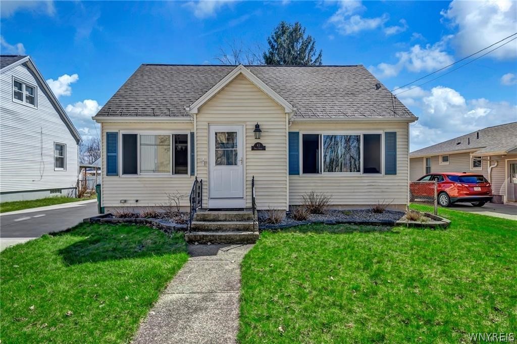 Looking for a turnkey fully updated home in South Buffalo?! Look no further! Unbelievably low taxes!! Large fully fenced backyard w/ 1.5 detached garage, concrete is in great shape. Walk through the front door to find the spacious kitchen featuring soft closed cabinetry, tile floor, tile backsplash, & large island / breakfast bar connected to the formal dining area. The large living room & dining room feature LVP floors, recessed lighting, fresh paint, & new trim / baseboard. The full bathroom features tile floor, tub, & subway tile throughout. There is 1 bedroom on the first floor featuring new window, new LVP floors, new trim, fresh paint & connects to the 3 season sunroom to the backyard. Head upstairs to find 2 more good sized bedrooms both featuring new carpet, fresh paint, new trim, & plenty of space. Bed 3 is getting a fixture installed prior to closing. Basement could easily be finished into additional living space! Driveway & patio poured in 21, bathroom remodeled 21, HVAC 18, kitchen 16, roof 12, some newer windows, rest of windows installed in 13. Showings begin immediately! Easy to Show!