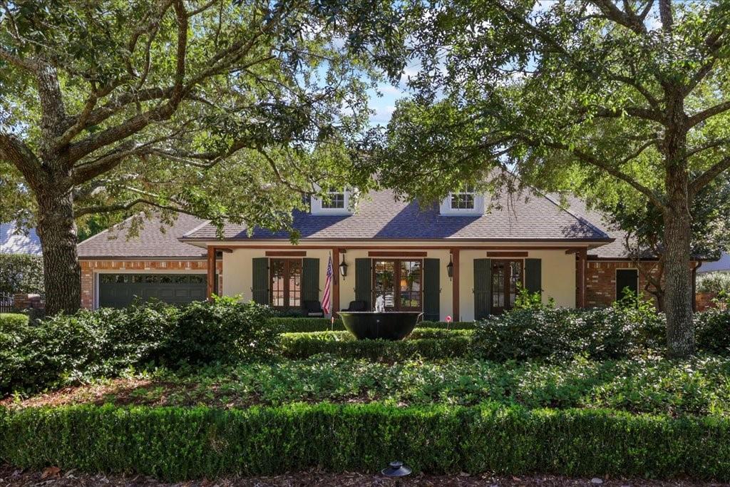 This fabulous home in a gated golf course community displays classic A. Hayes Town styling with so much to offer including an inground pool, screened porch, cabana with outdoor kitchen, professional landscaping, whole house generator and more. The home offers 4 bedrooms, 4.5 baths plus a game room, study and large bonus room. The Chef's Kitchen has everything imaginable such as Viking appliances, built in double refrigerator/freezer, 6 burner gas stove with grill, warming drawer, Miele espresso machine, 2 dishwashers and an icemaker. The laundry room is more than you could wish for with tons of space and storage. The Primary bedroom is spacious and offers a French door to the screened porch, 2 custom closets, large tub and walk in shower with multiple heads. The study down has a full bath next door and could be converted to an additional bedroom down. Upstairs you will find 3 bedrooms, a large game room plus a bonus room. The rear yard is an oasis and backs to woods. The cabana offers a full outdoor kitchen. There has been extensive replacements and upgrades over the past 2 years including the roof, screened porch, gutters, 3 HVAC systems, most windows, water heater, and much more! Take a look at this very special home!