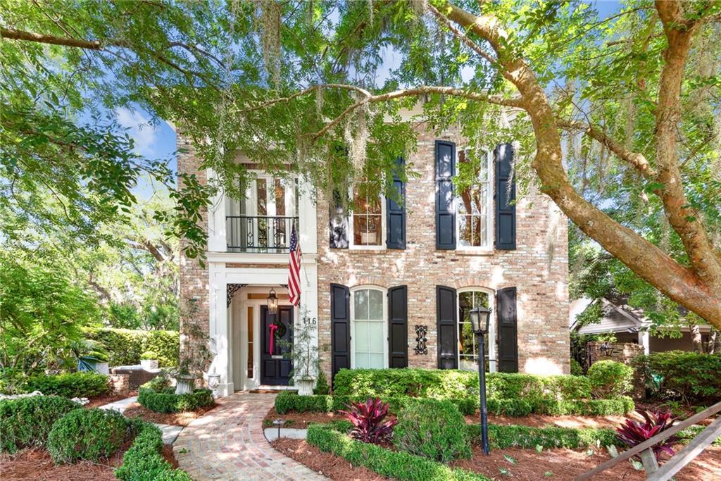 Nestled in the charming heart of Old Covington, this exquisite home offers a perfect blend of luxury and convenience. Just a leisurely stroll away from the vibrant energy of downtown Covington and the serene beauty of Bogue Falaya Park. Step inside to discover a world of elegance with stunning white oak floors guiding you through each room. The timeless allure of the Old Chicago brick exterior sets the tone for a residence that seamlessly marries classic charm with modern comforts. A fireplace imported from Italy adds a touch of romance, while the convenience of an elevator and a whole house generator ensures that every aspect of luxury living is effortlessly catered to. From the luxurious Gaggenau cook top and fridge, to the exquisite Murano chandelier in the kitchen. This home is not just a dwelling but a sanctuary where every detail has been meticulously curated to elevate the art of living.